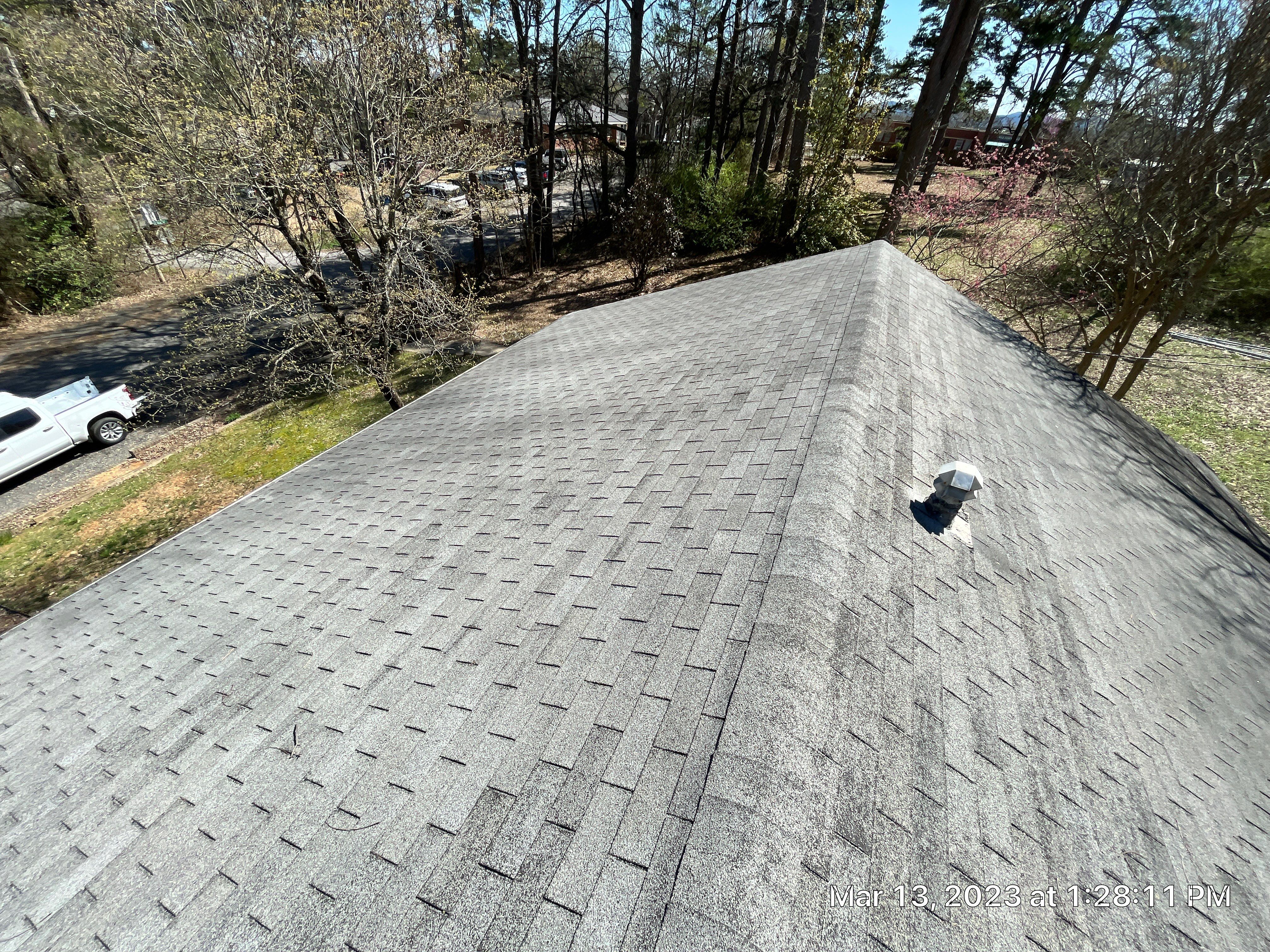 Residential Roofing Installation using 26 Gauge Colored Panels by Hostetler Roofing