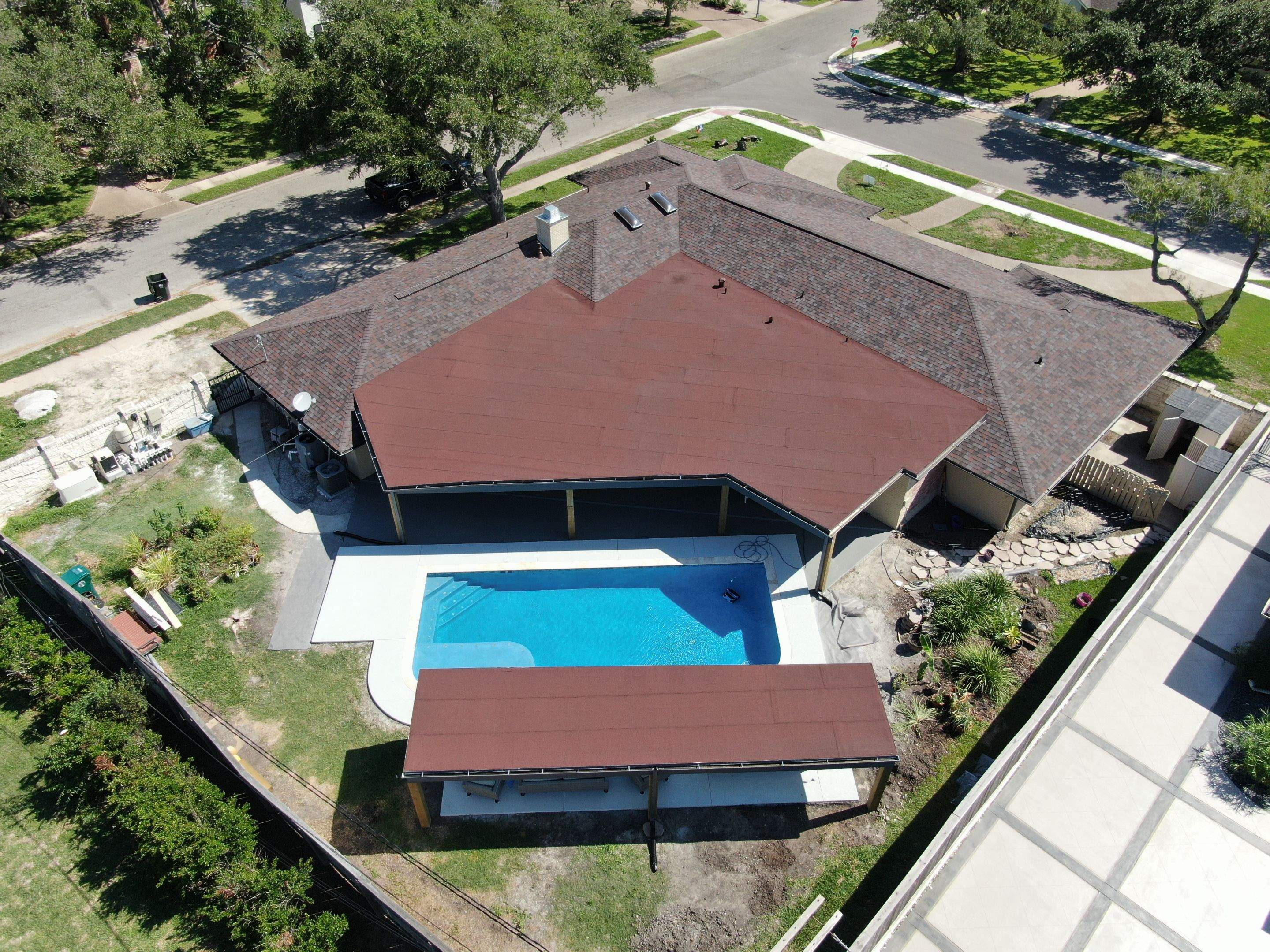 Beautiful pool side build by Bayfront Roofing and Construction