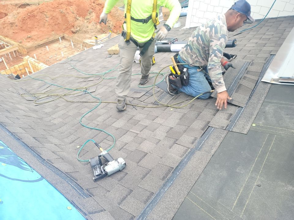 Residential Roofing Installation using Roof Replacement by American Roofing & Construction LLC
