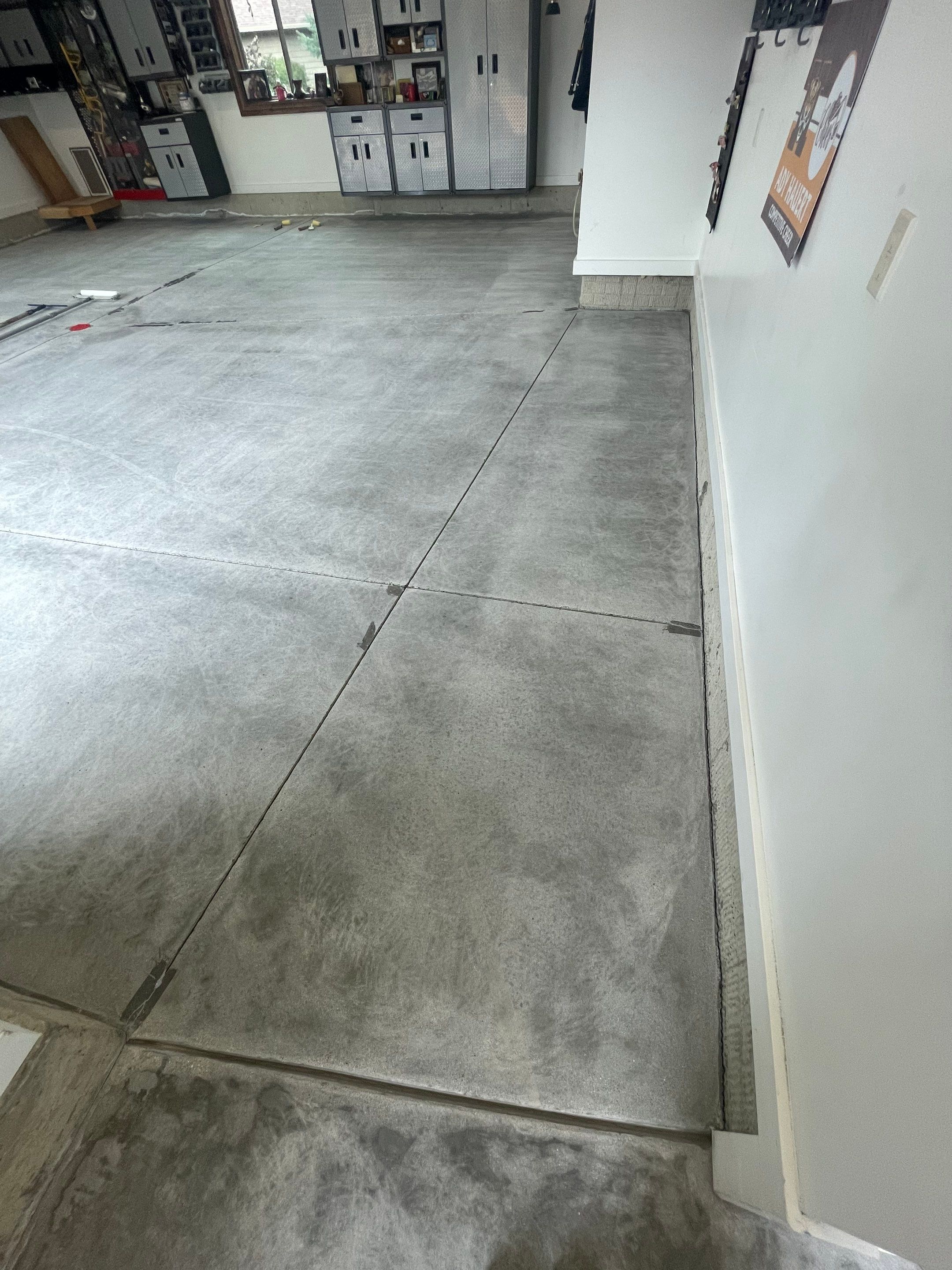 Garage Floor Coating and Domino Flake Finish in Sioux Falls by Select Painting, Coatings & Garage Cabinets