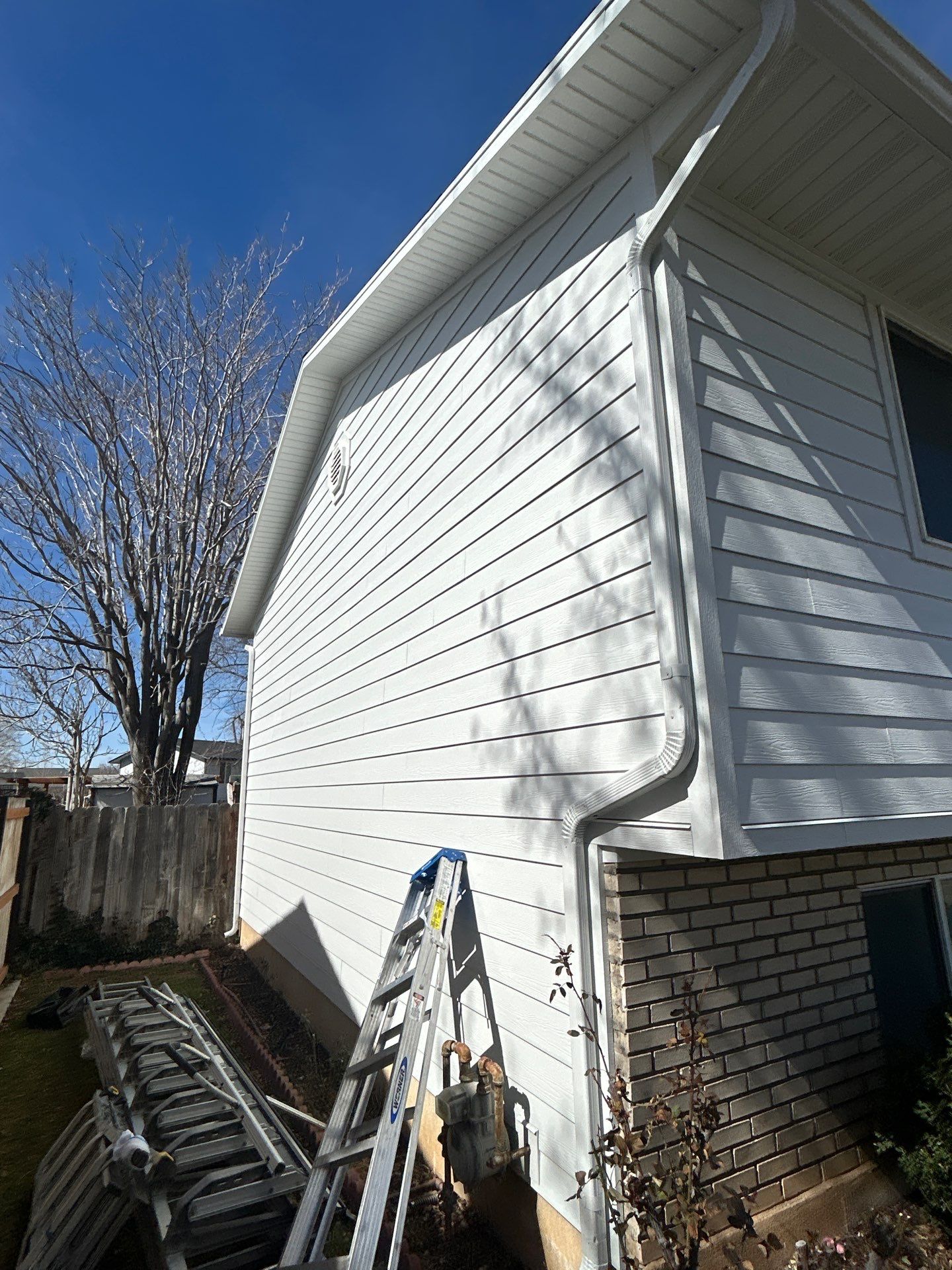 Orem | Crisp Monochromatic Hardie Upgrade | Arctic White by Ideal Siding Utah