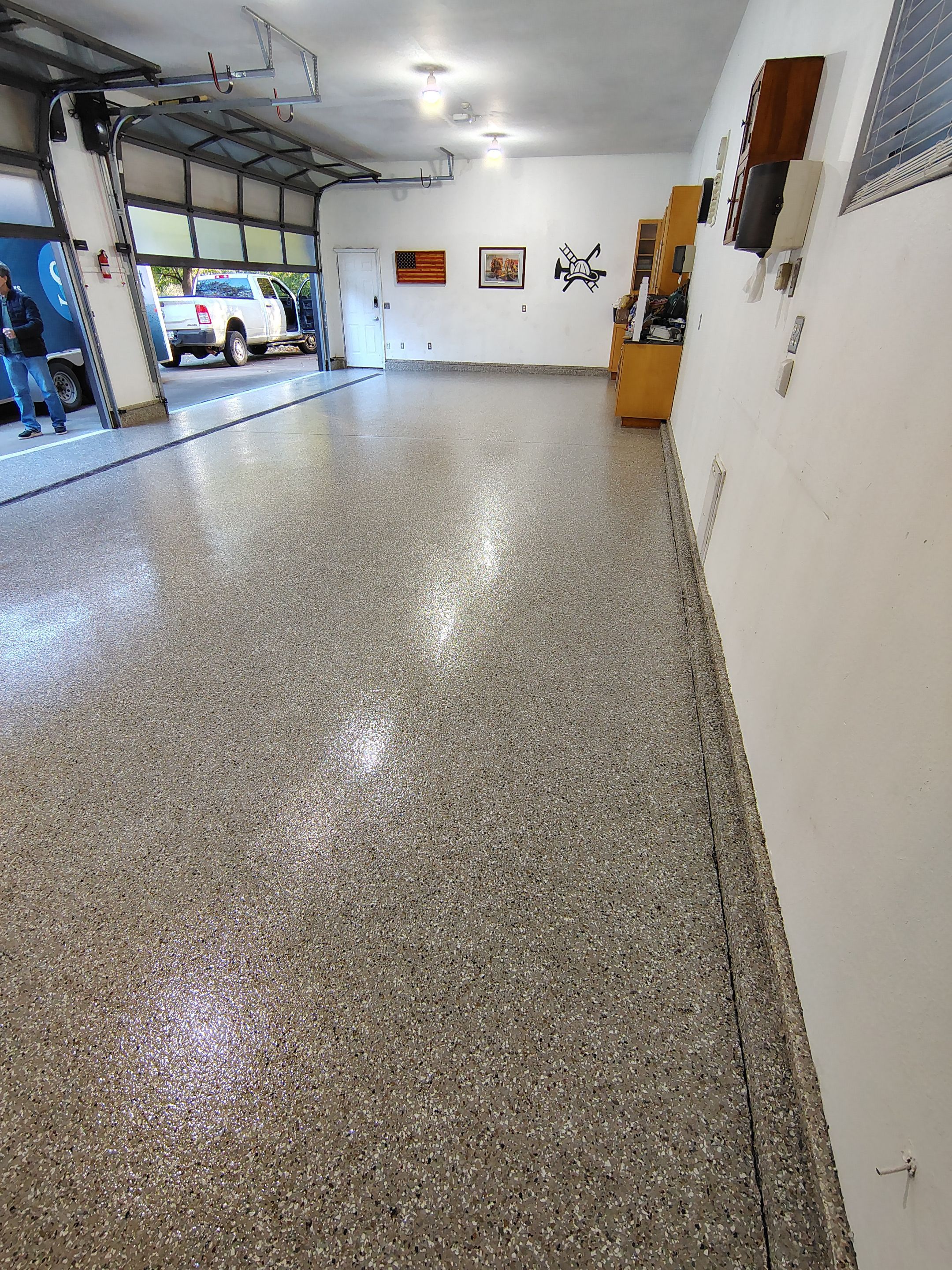 Garage Floor and Entry Step Concrete Coating in Sioux Falls by Select Painting, Coatings & Garage Cabinets