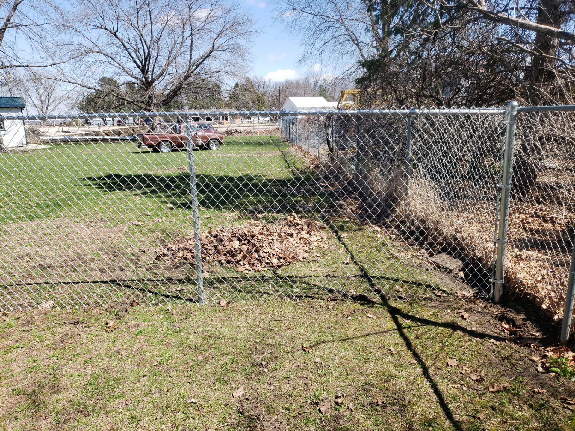 Residential Galvanized Chain Link Perimeter Fencing and Gate Installation by Perfect Picket Fence and Stain