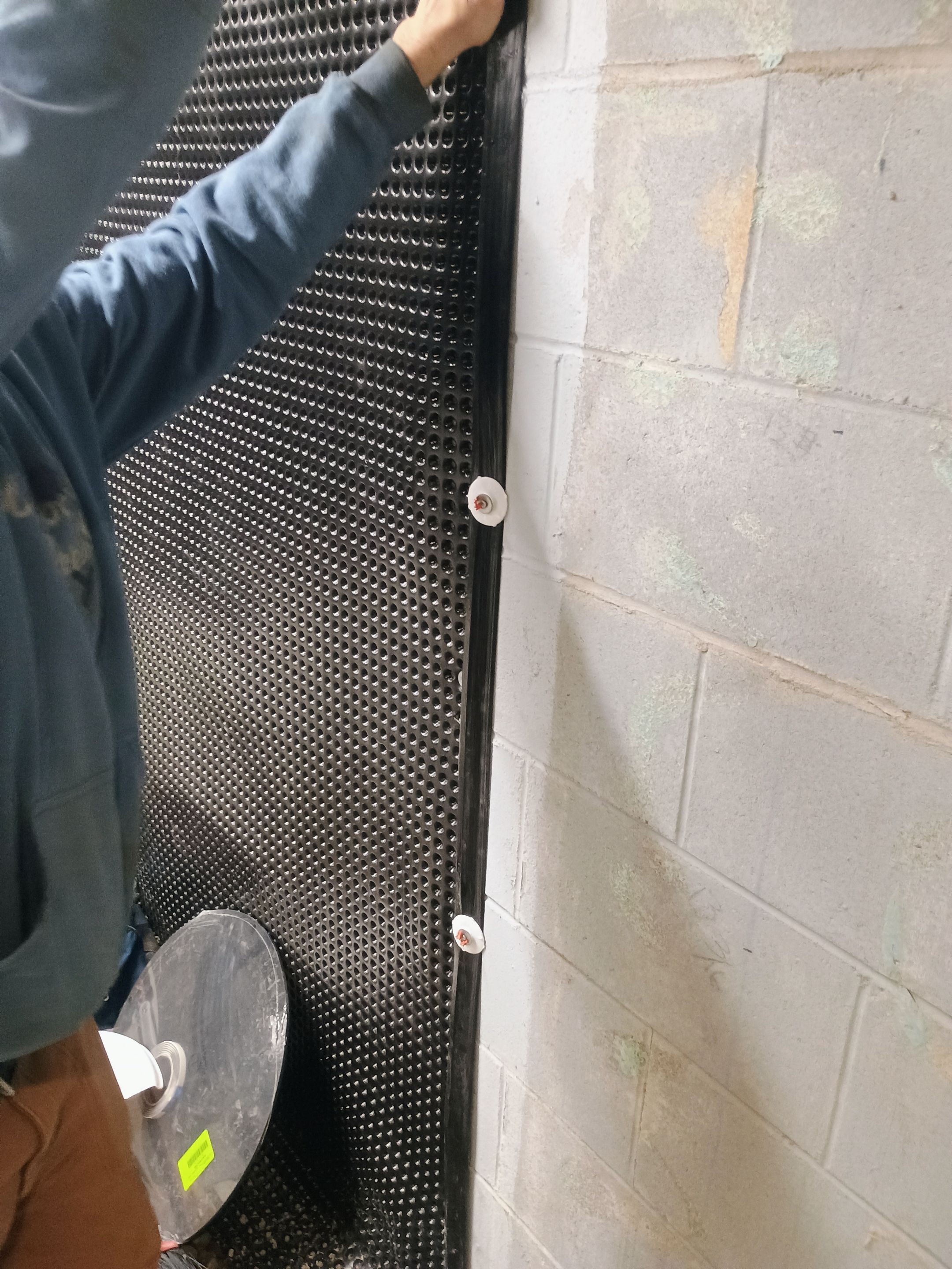 Depressurizing Denny's Basement Wall by Waterproofing Northeast