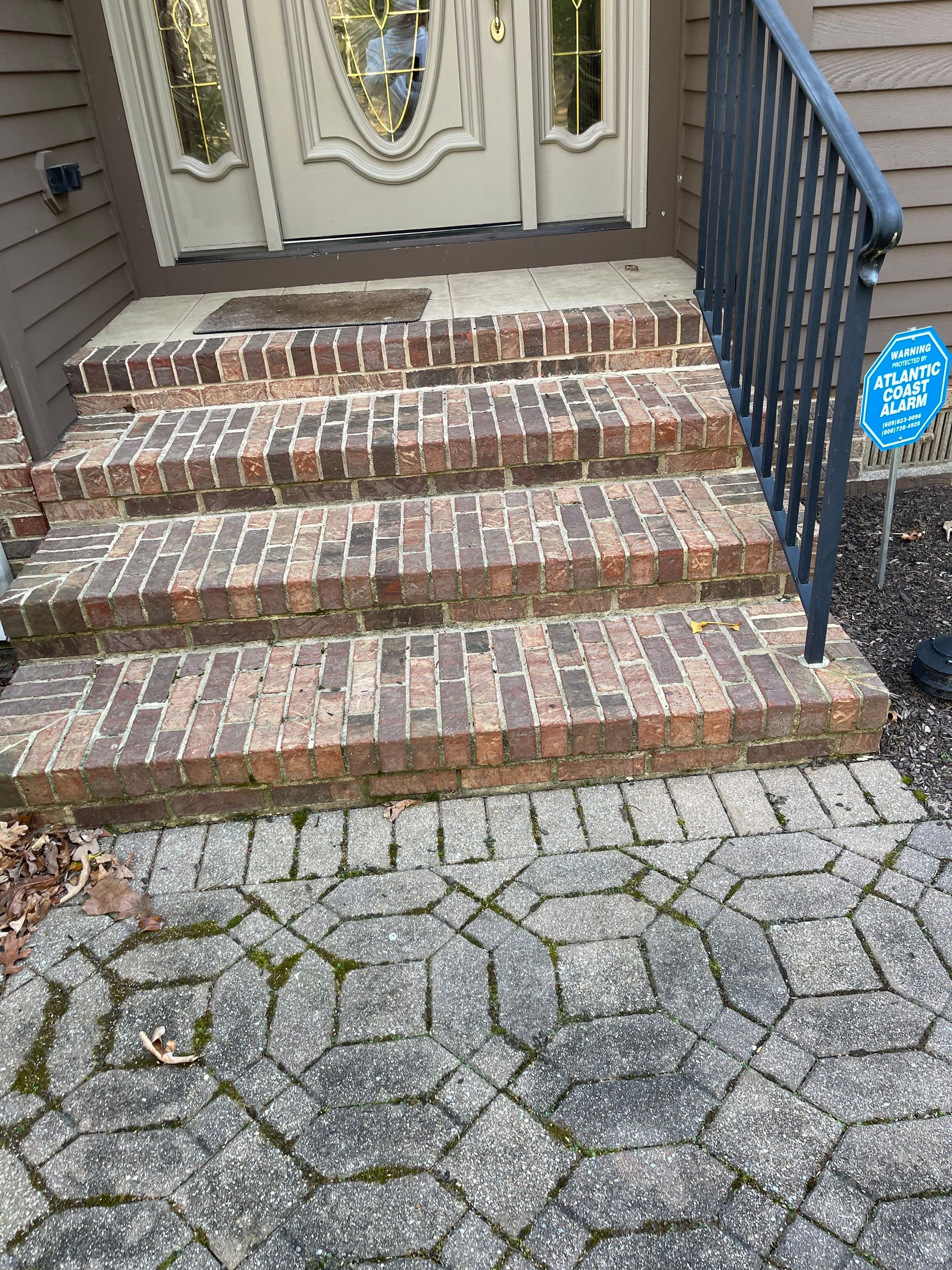 Pavers Cleaned, Garage and Concrete walls by SJ Exterior