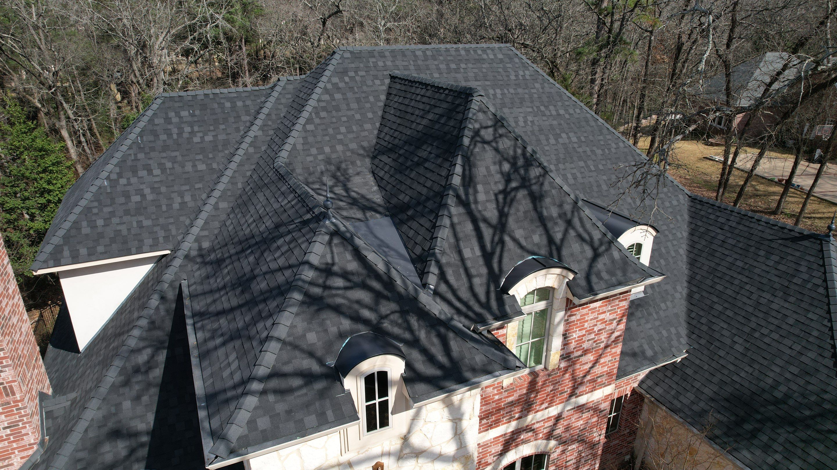 Residential Roofing Installation using IKO Dynasty Class 3 - Shadow Black by Sky High Roofing