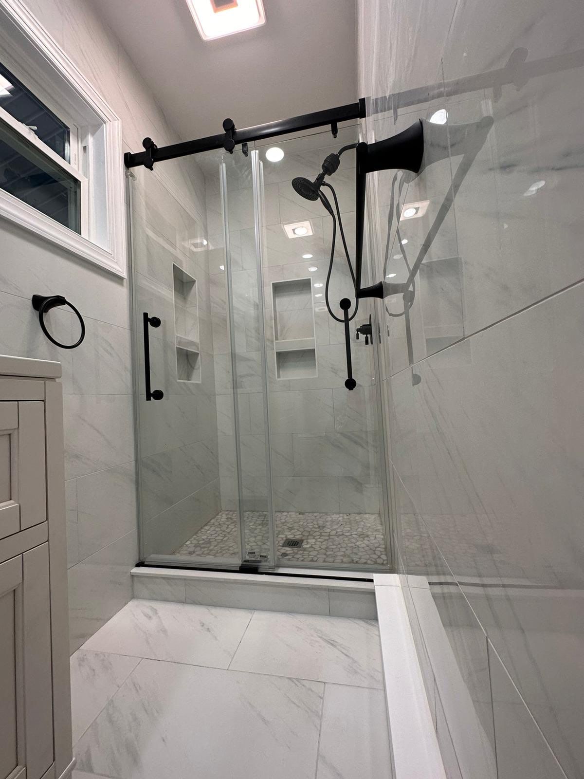 Bathroom Remodel using Tile by Home Concepts Construction