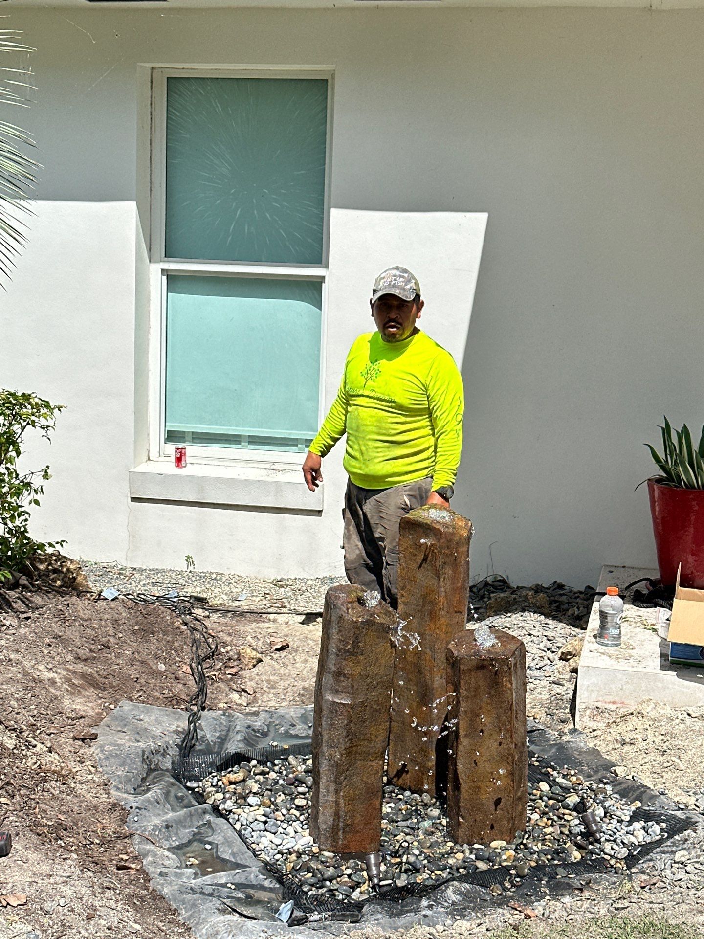 Pinecrest Fountain at Door Entrance by Nature's Dream Landscape and Tree Service