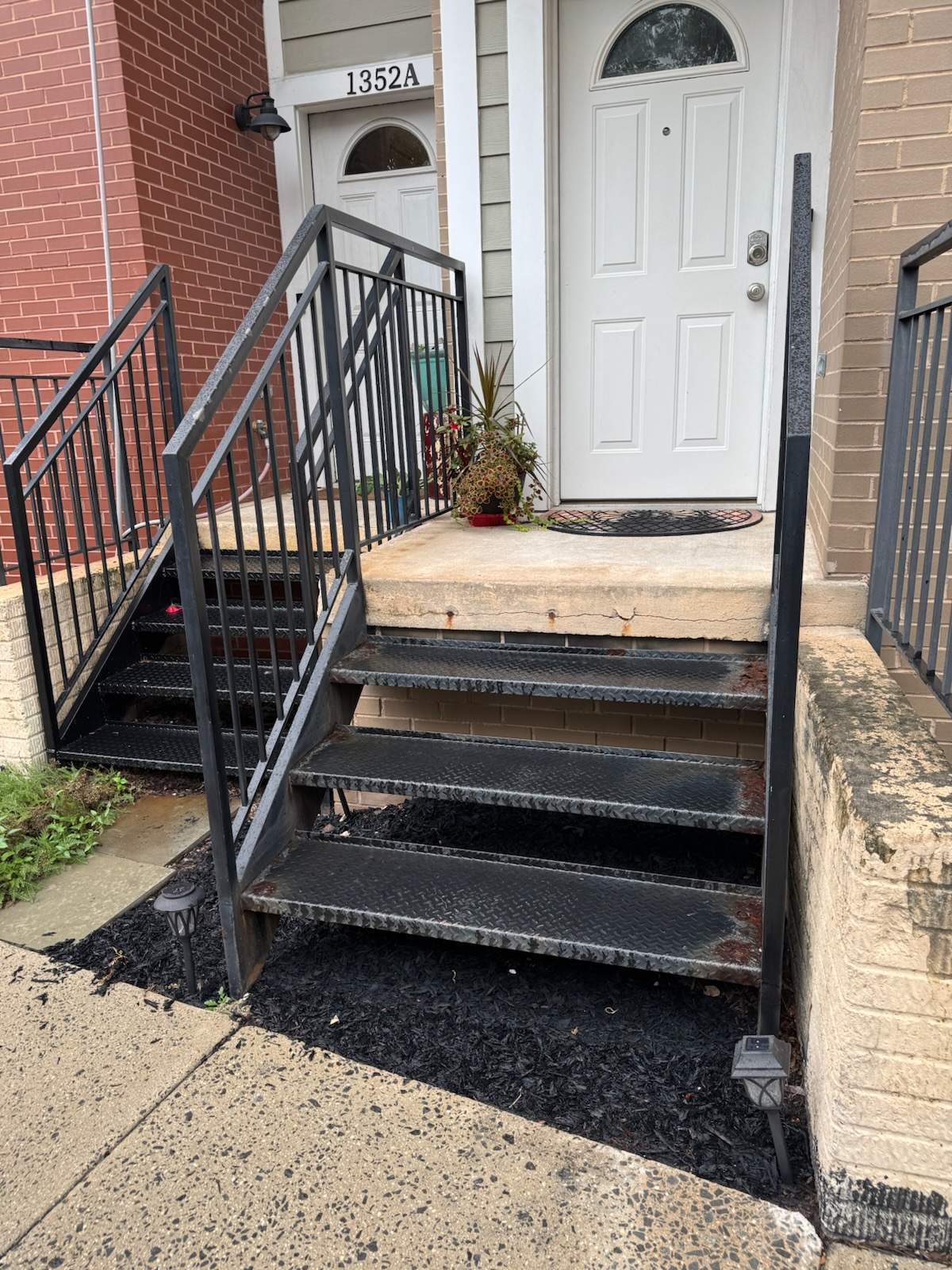 Black Metal Diamond Plate Staircase Restoration in Washington, DC by Capitol Iron Works
