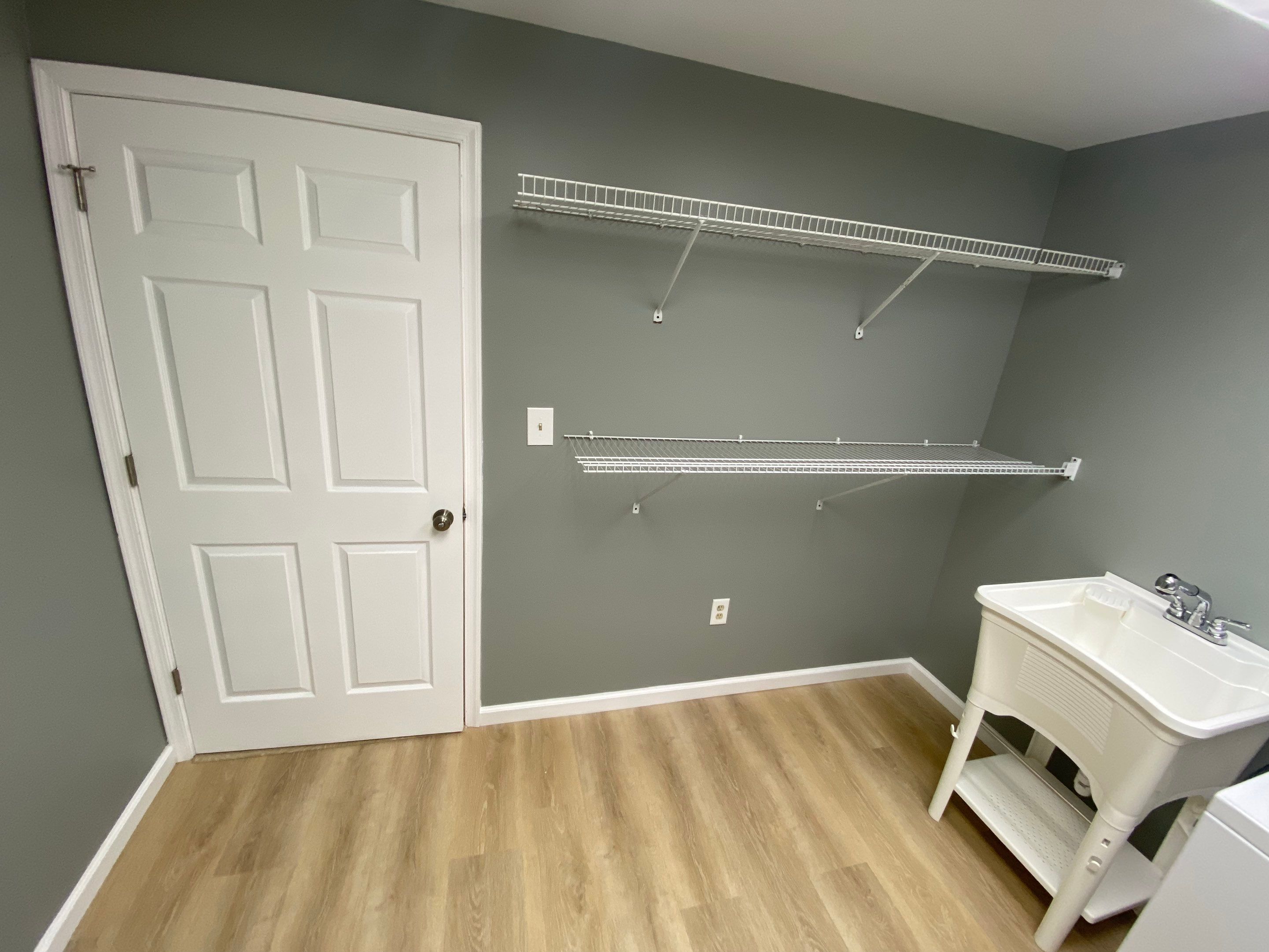 Laundry Room Redmodel using Lifeproof Luxury Vinyl Plank Flooring by The Smet Companies, LLC