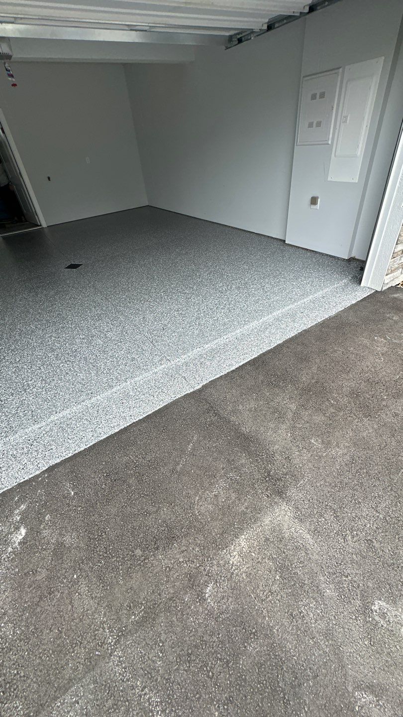 Porch + Garage Project in Evans City by Floors in a Day, Inc