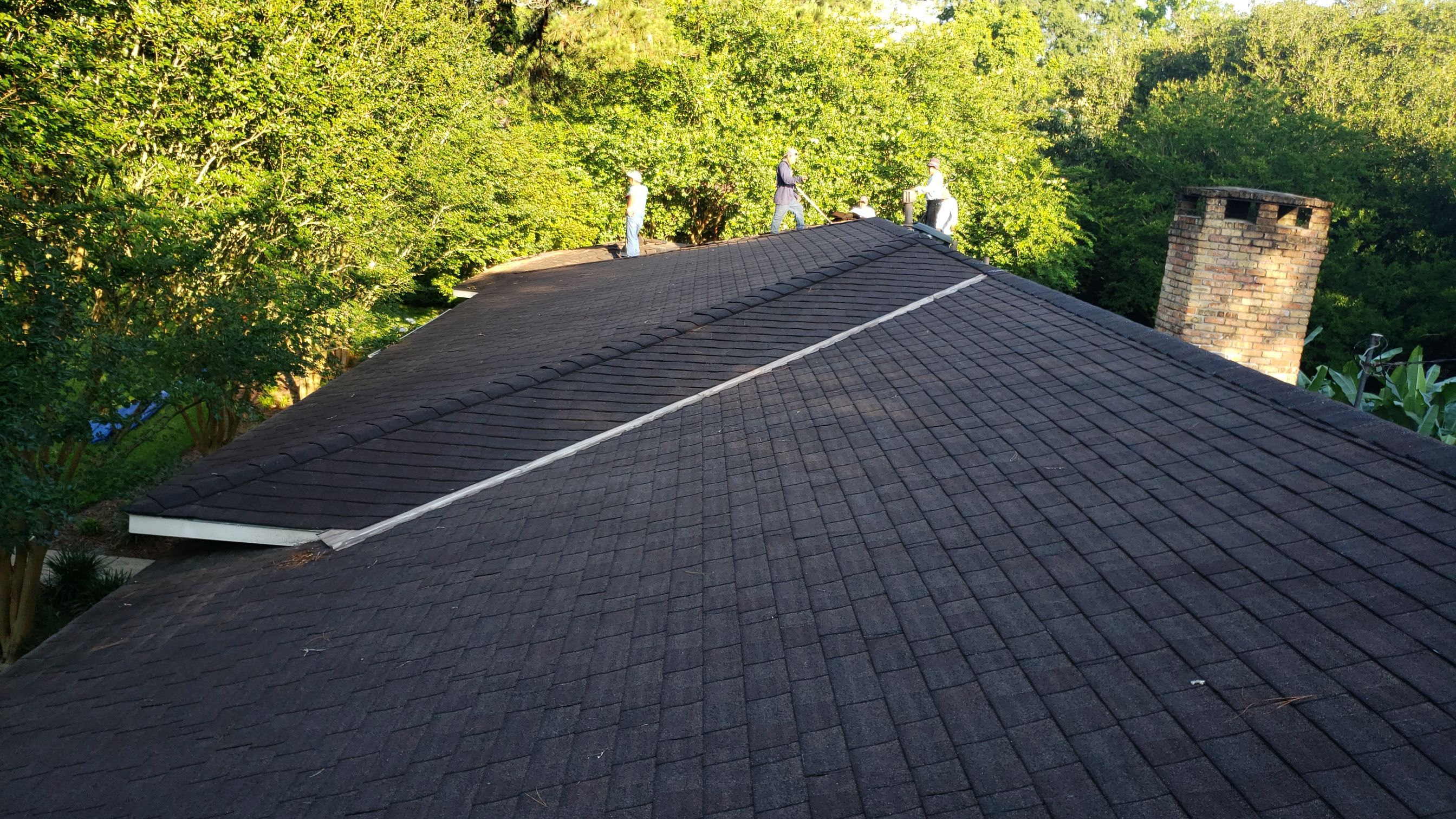 Residential Roofing Installation using Roof Replacement by American Roofing & Construction LLC