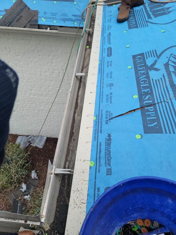 Residential Roofing Installation using Roof Replacement by American Roofing & Construction LLC