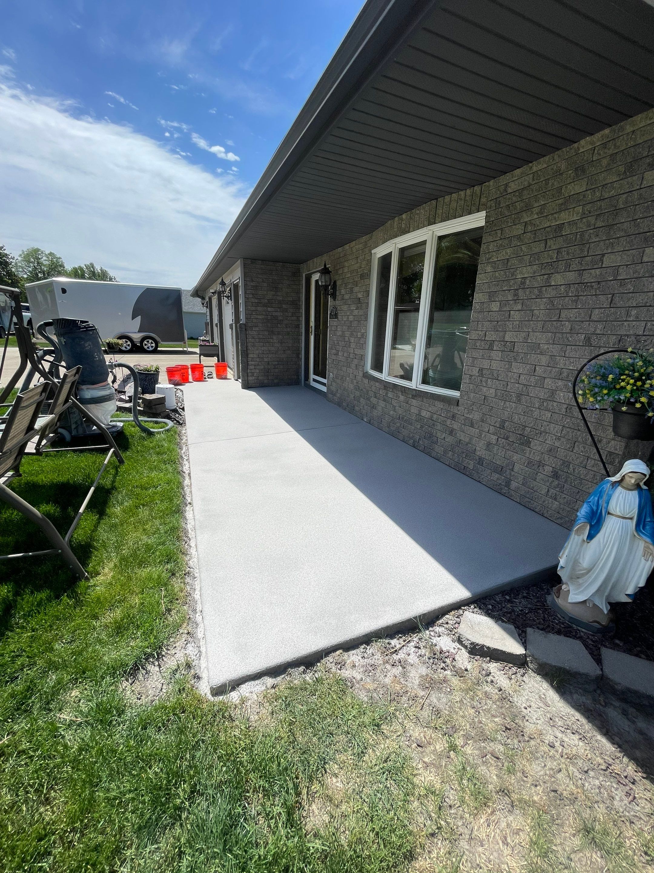 Custom Grey Flake Epoxy Garage Floor Installation in Remsen by Select Painting, Coatings & Garage Cabinets
