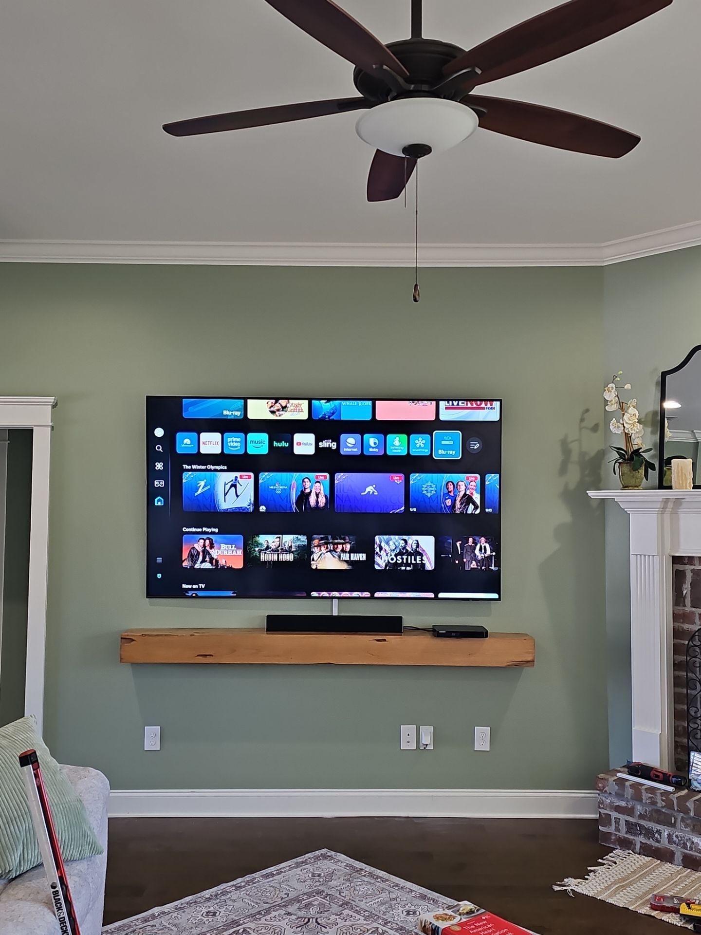 Floating Furniture, Fireplace Mantel, & Electric Fireplace Installation Projects by Hangman Mounting & Installation 