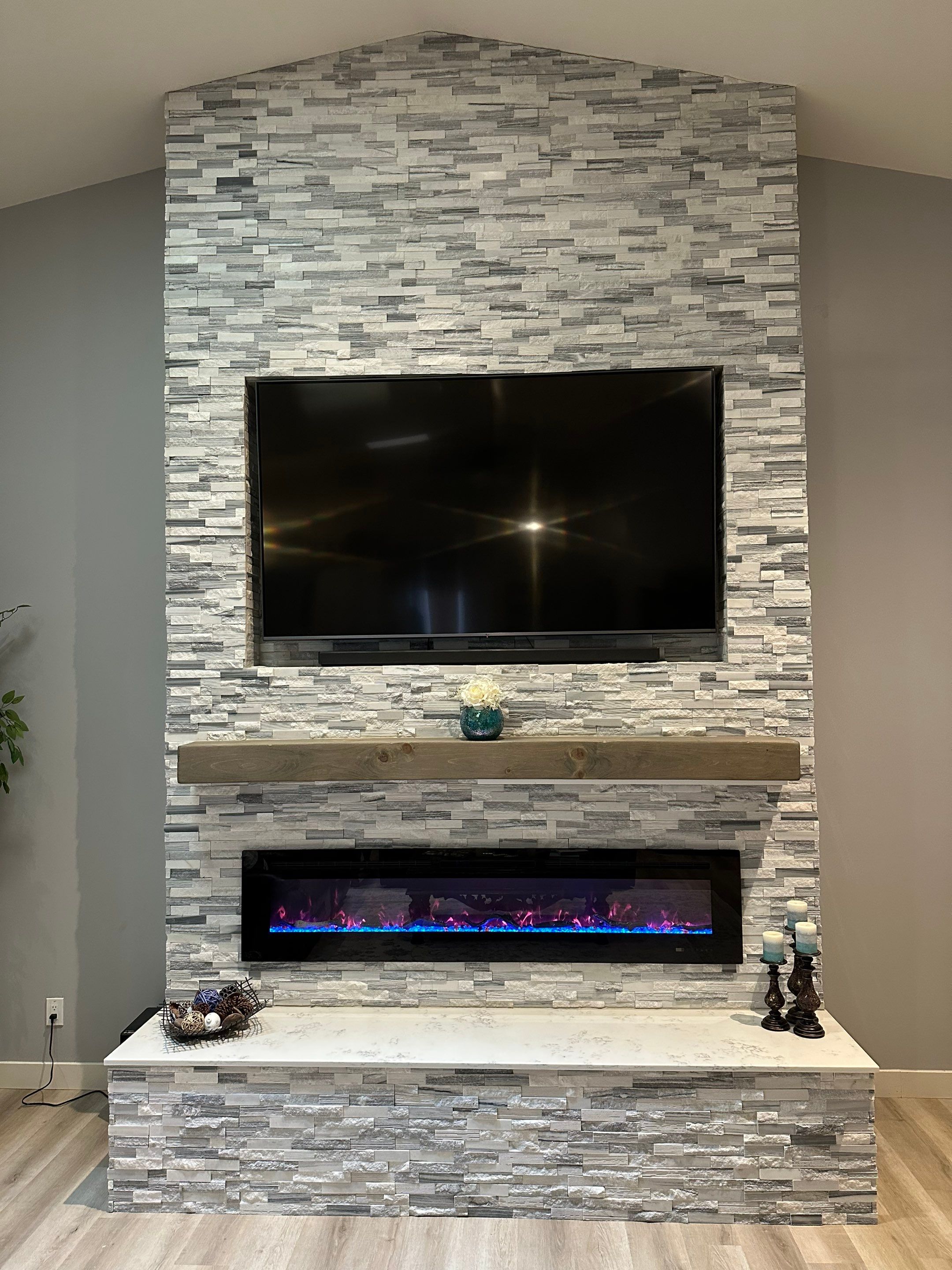 Stacked Stone Electric Fireplace by Footprints Floors of Chandler 
