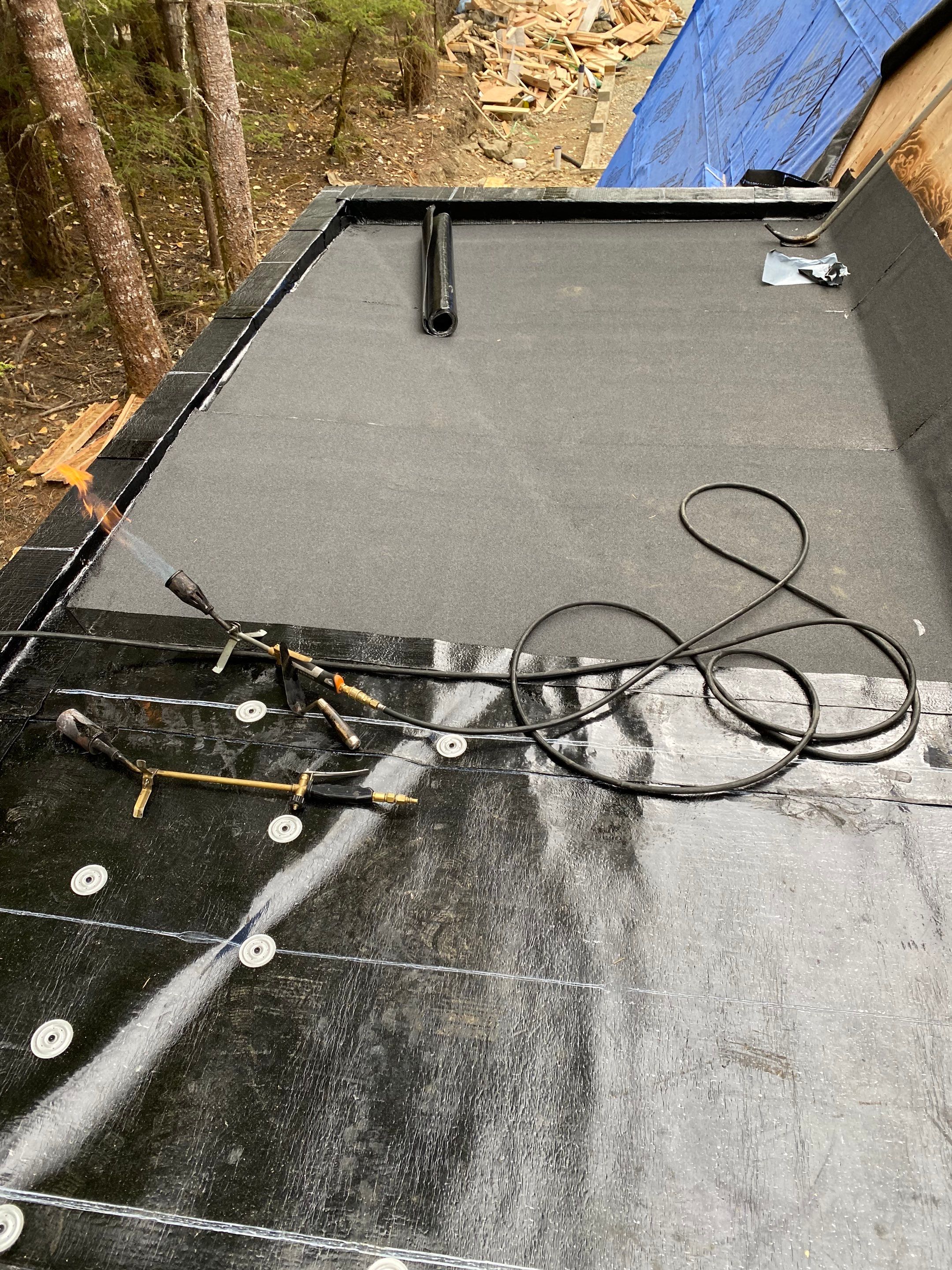 Residential Roofing Installation using 12" Prolok metal  by Top Notch Roofing Inc