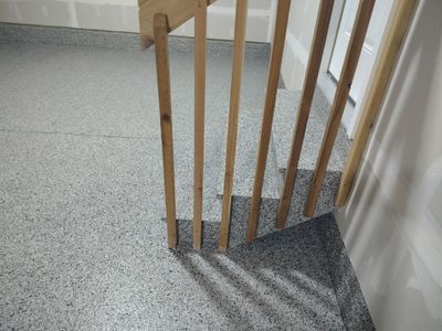 Adel, IA Garage: Complete Keystone Wrap on Floors, Stairs, and Stem Walls by Revival Concrete Coatings