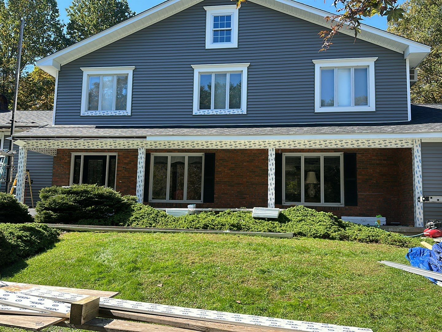 Residential Roofing Installation using Owens Corning TruDefinition Duration AR - Onyx Black & New Siding Using Mainstreet Charcoal Gray by A Plus Exterior