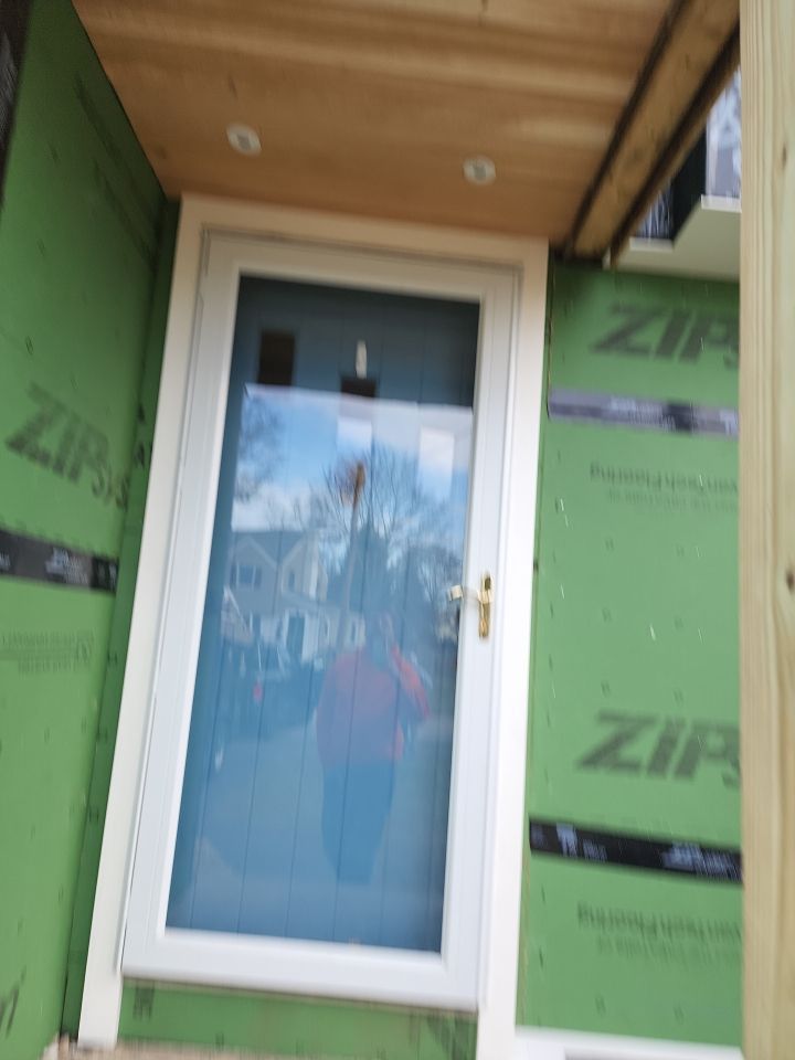 James Hardie siding, new metal roof and couple windows being installed. by UBrothers Construction