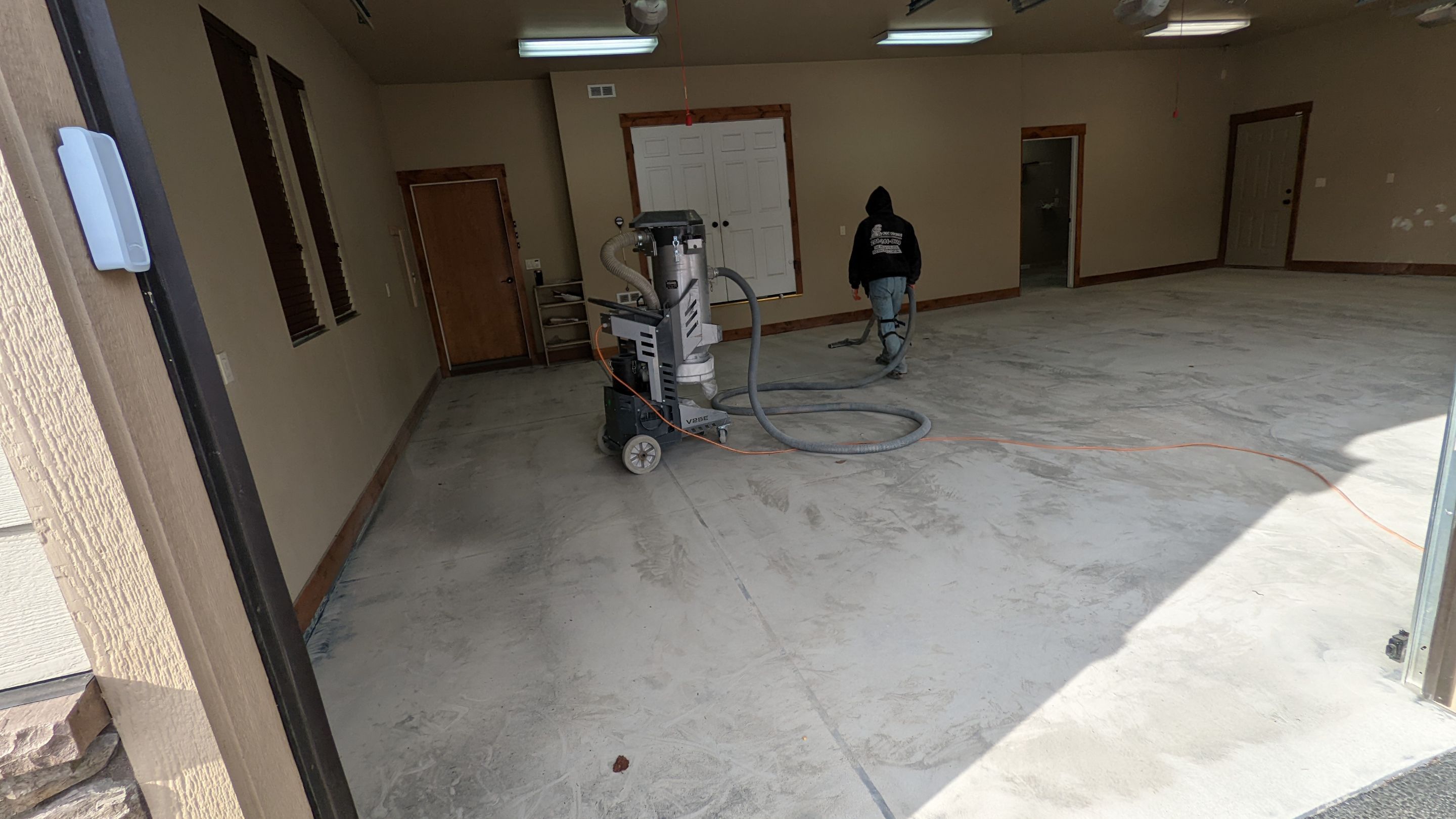 Garage Transformation using Sandstone by Croc Coatings, LLC