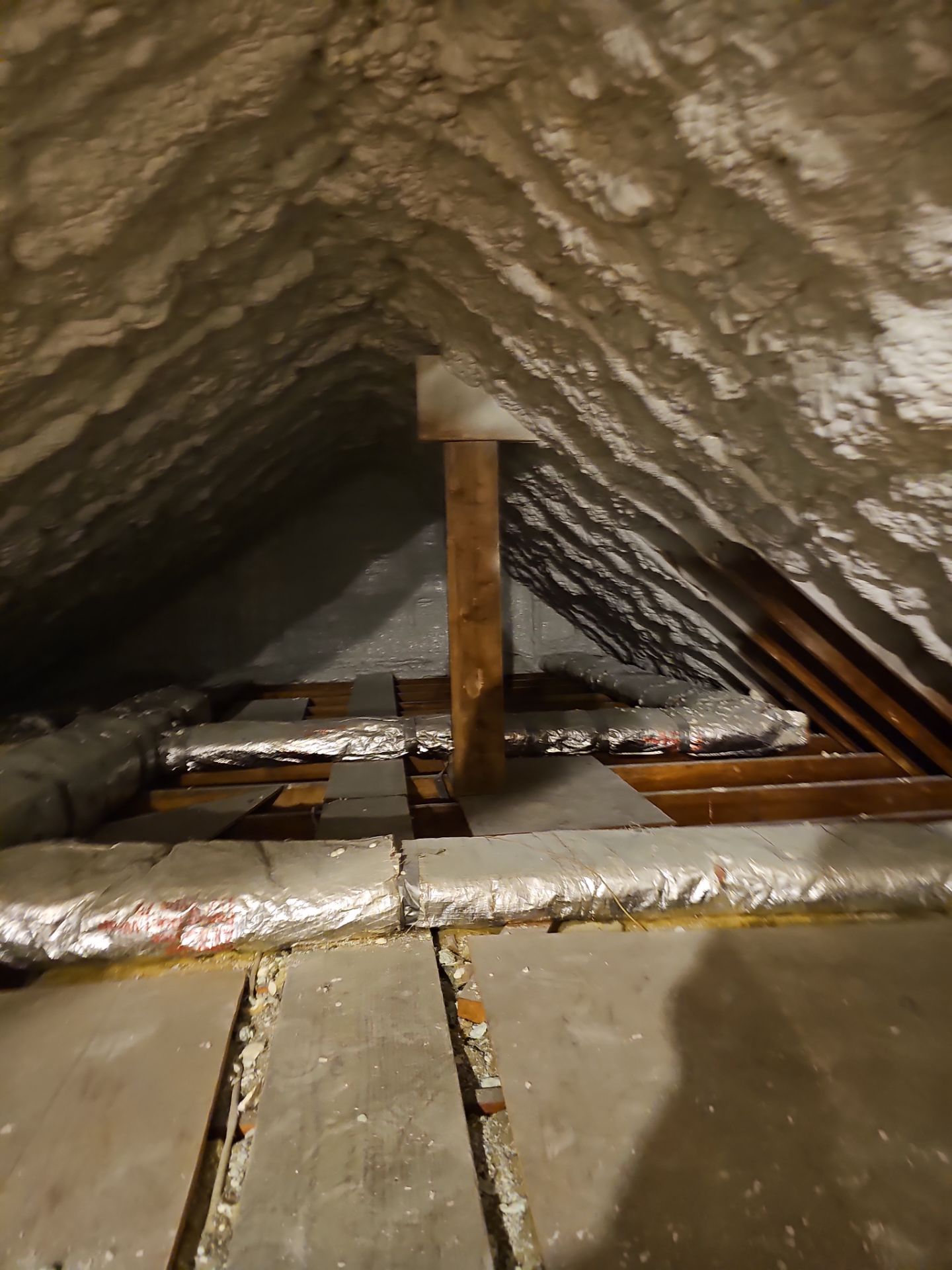 Attic Retrofit using open cell spray foam by NYS Foam & Energy