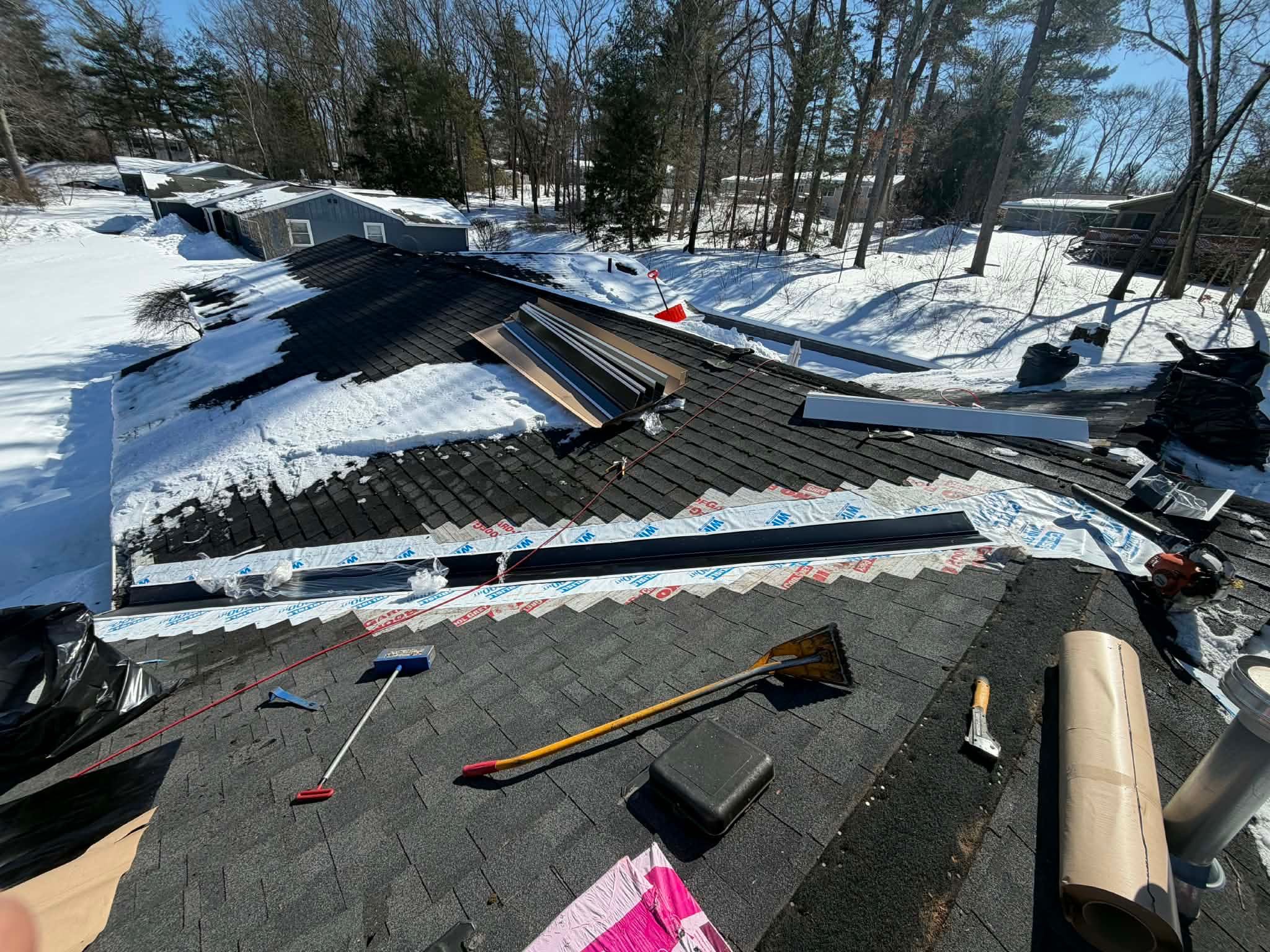 Ridge Cap Replacement & Black Metal Valley Installation in Chelmsford, MA by Mighty Dog Roofing of Greater Middlesex County