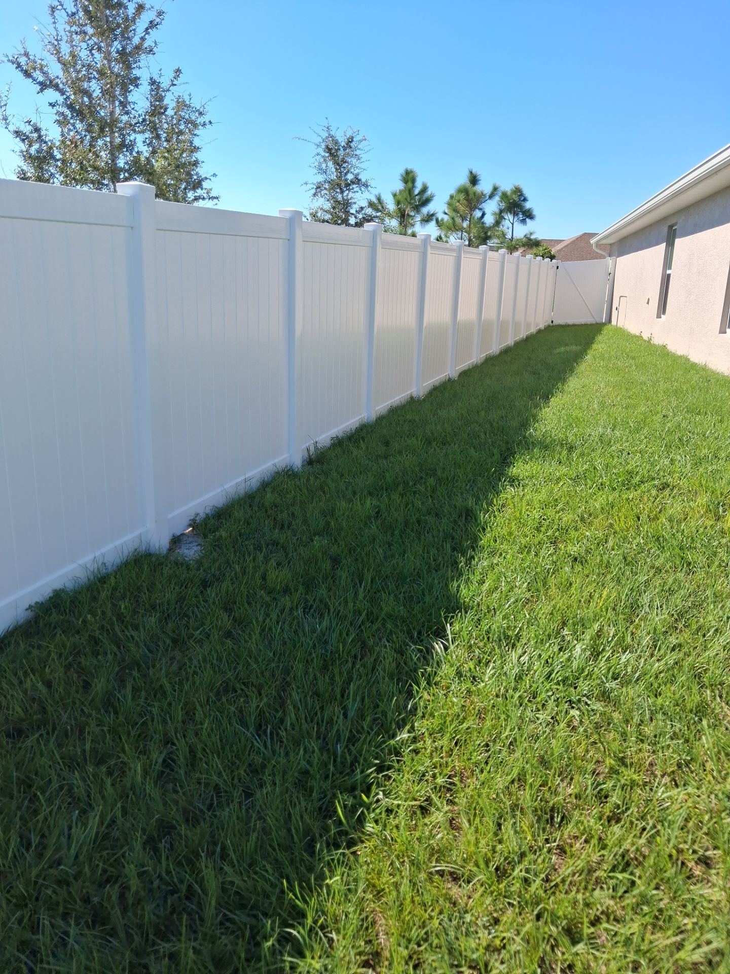 White Vinyl Privacy Fence Installation for North Port Residence by True Fence LLC