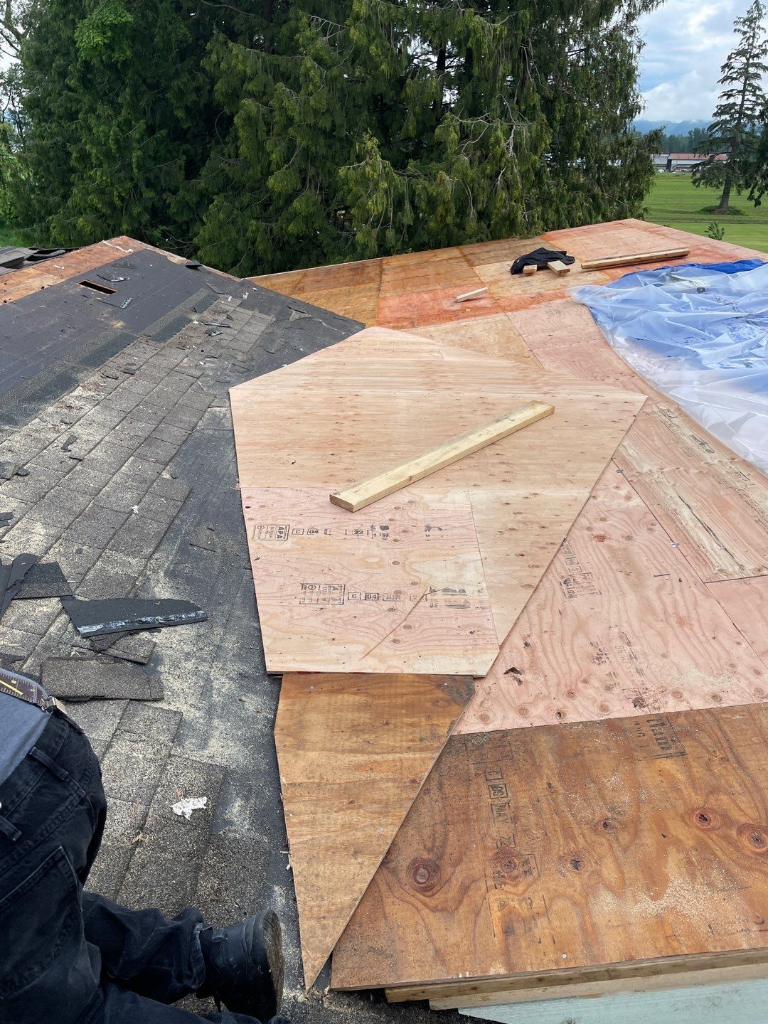 Residential Roofing Installation using 12" Prolok metal, shingles and Torch on roofing by Top Notch Roofing Inc