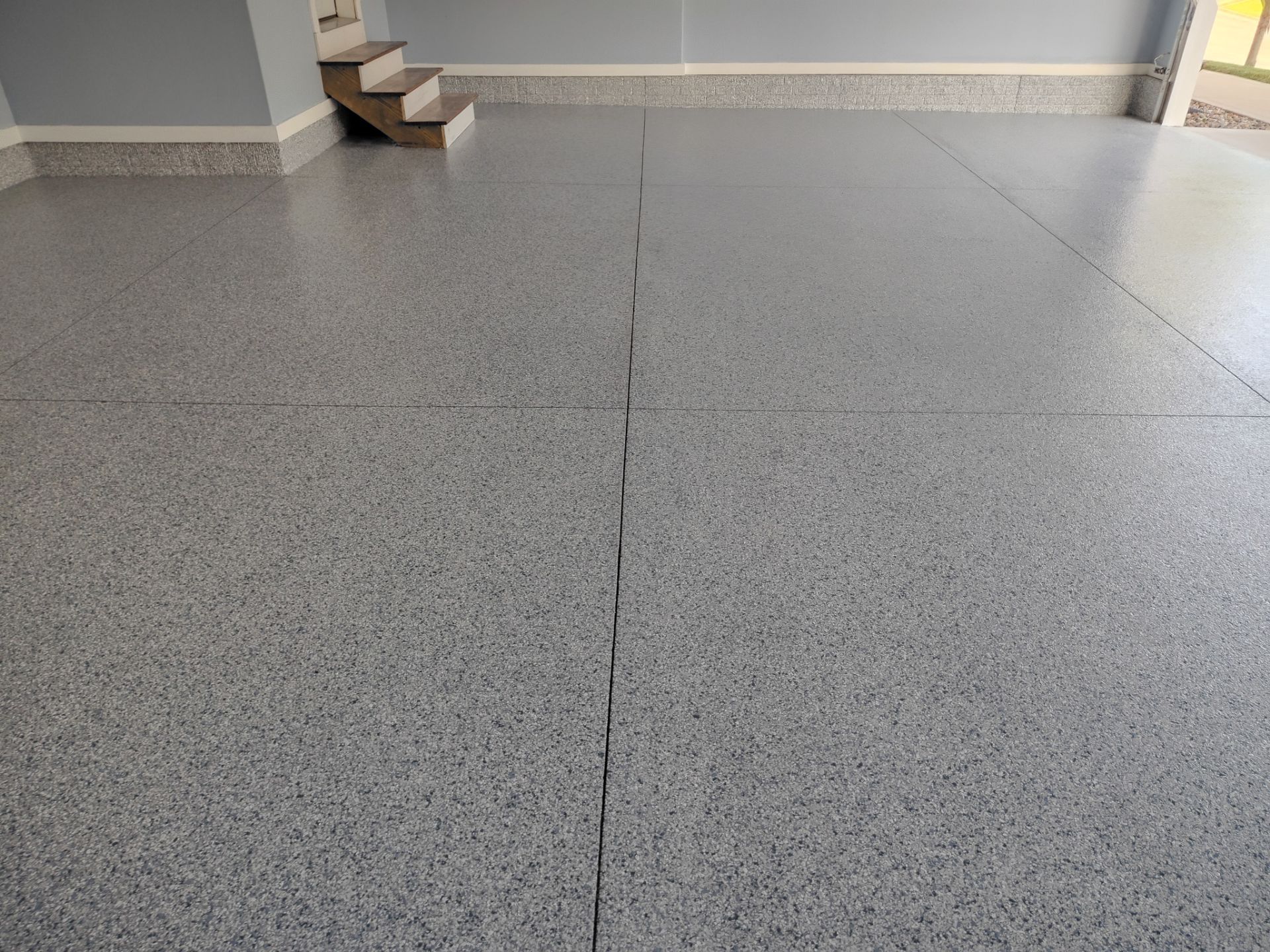 Tidal Wave Garage Transformation in Adel, Iowa by Revival Concrete Coatings
