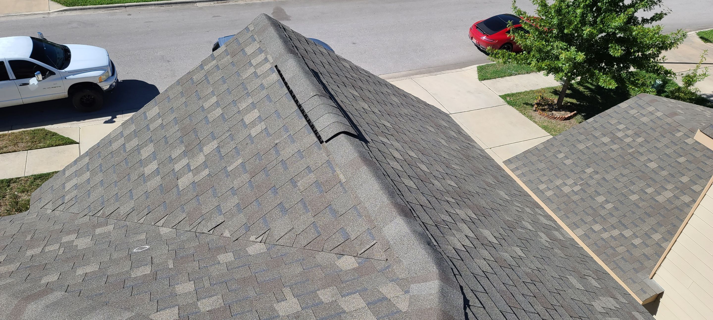 Austin Residential Roofing Replacement with Architectural Shingles and Flashing by Caliber Restoration LLC