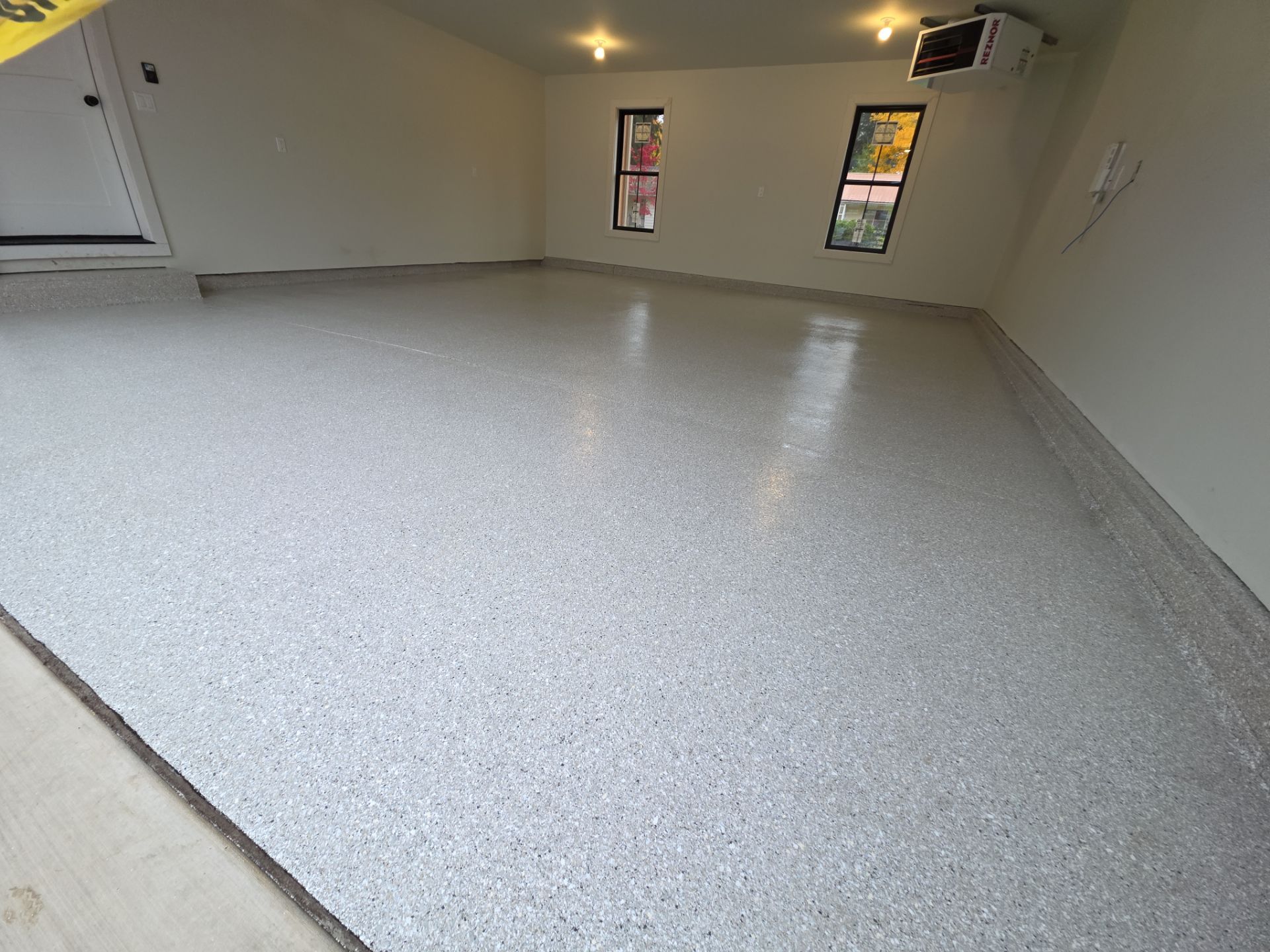 Garage Transformation using Limestone Hybrid by Croc Coatings, LLC