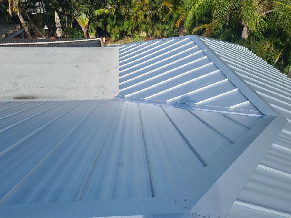 Residential Roofing Installation using 1" Nail strip metal roof by BLUES BROTHERS ROOFING