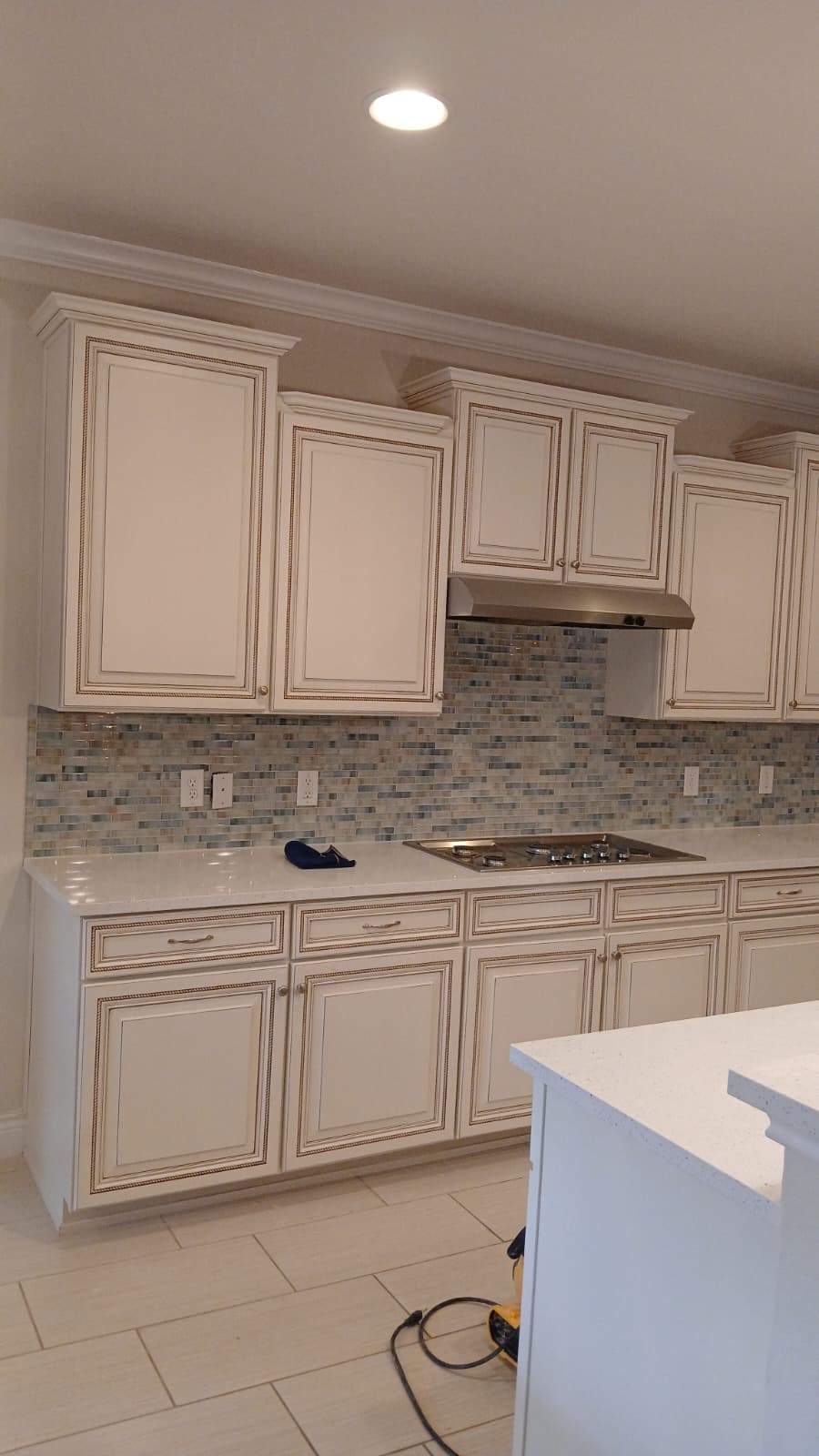 San Antonio Kitchen Remodel with Quartz Counters and Glass Backsplash by Mena stone surfaces