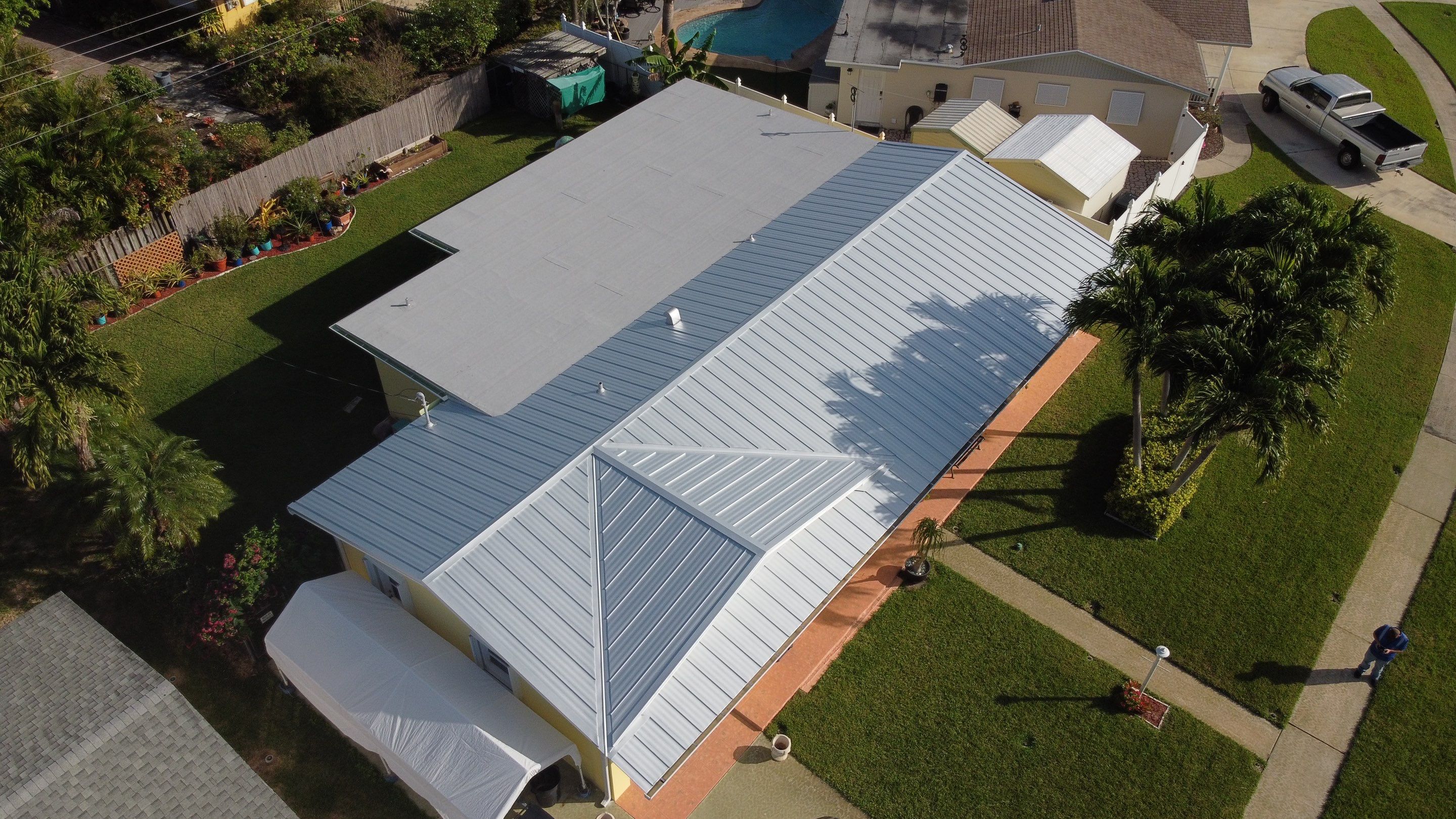 Residential Roofing Installation using 1" Nail strip metal roof by BLUES BROTHERS CONSTRUCTION CORP
