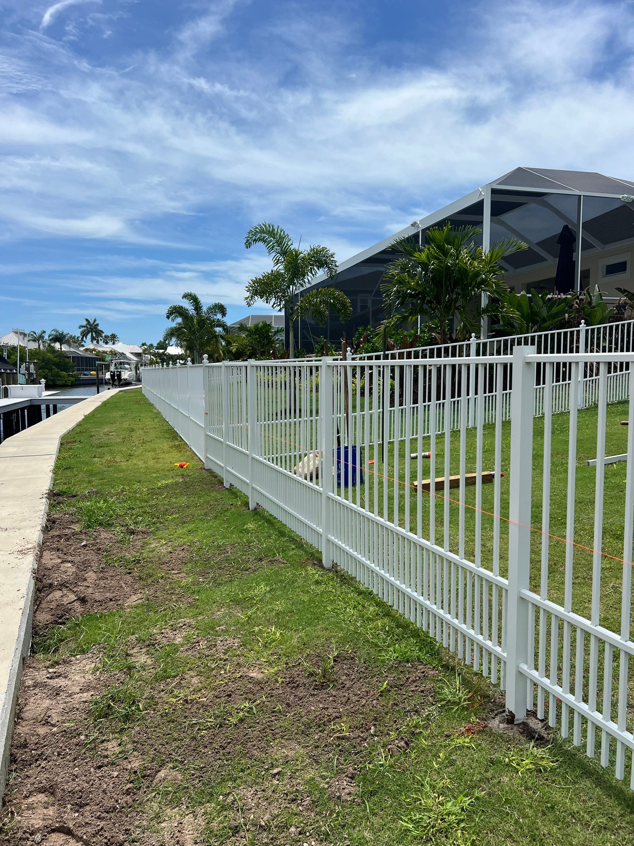 Aluminum Fence Installation using White Aluminum Puppy Picket Fence by Asap fence and gates, LLC