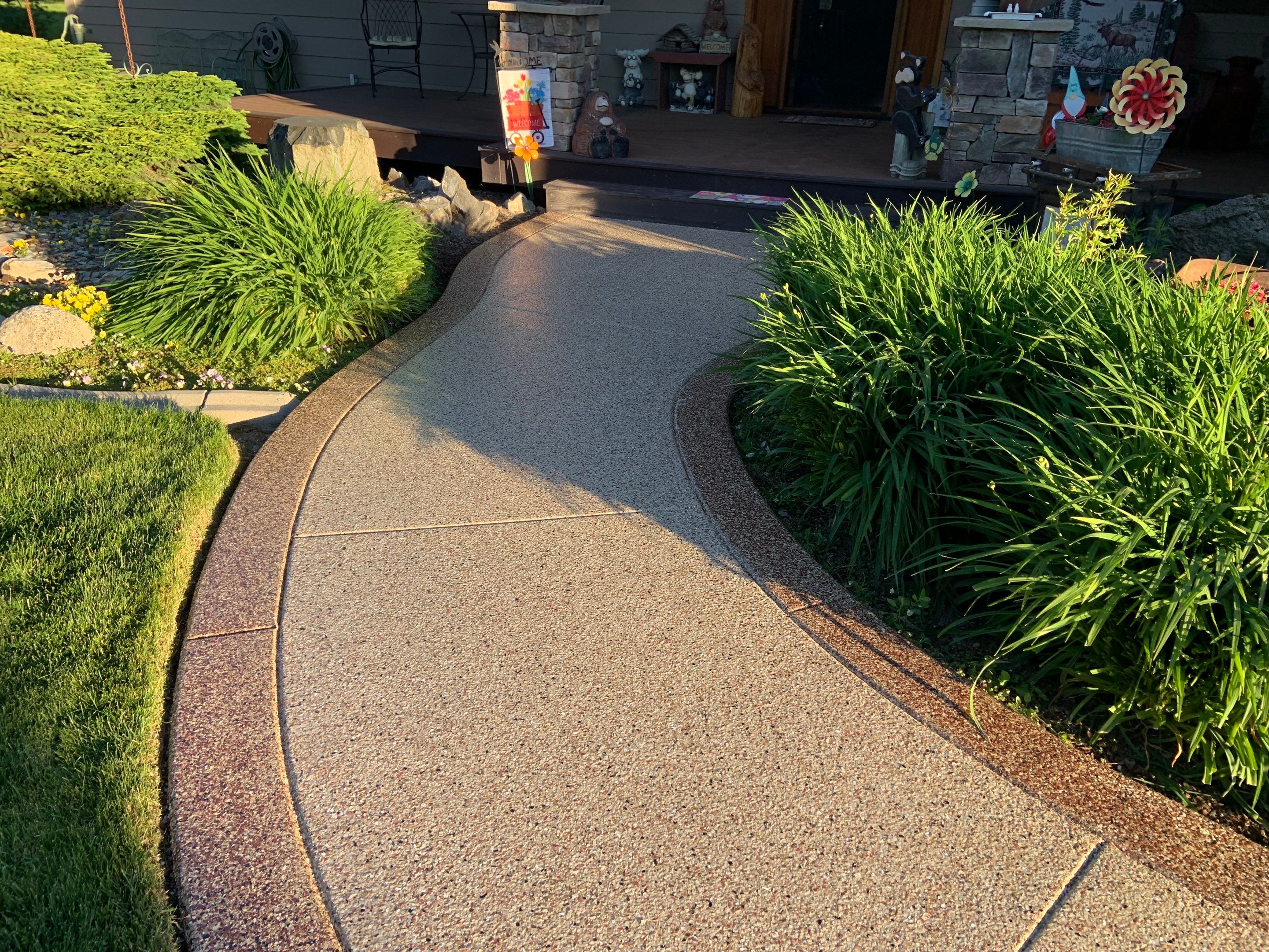 Driveway using Pecan and Chestnut Trim by Croc Coatings, LLC
