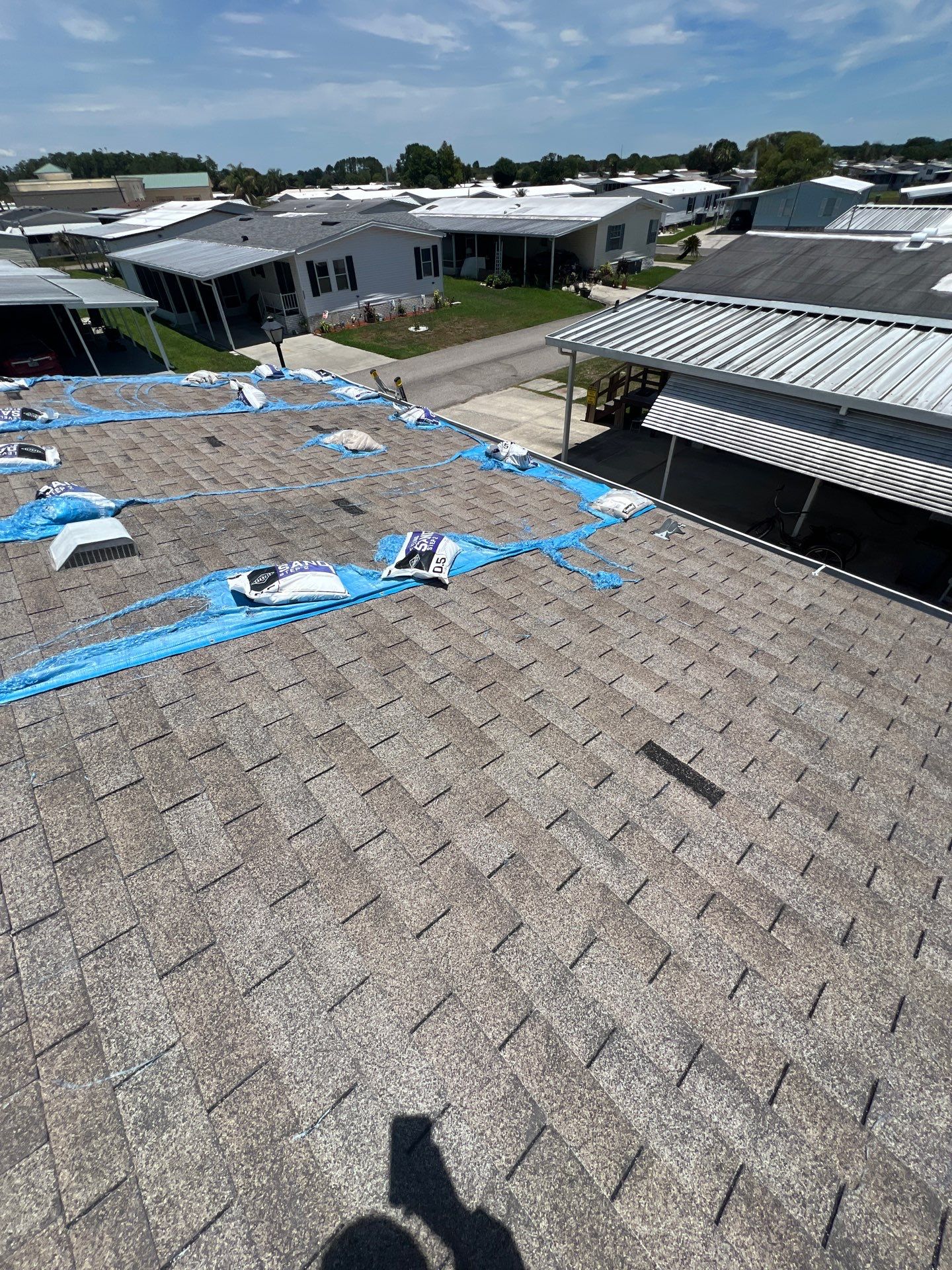 Orlando Residential Standing Seam Metal Roof Installation in Light Stone by Pinnacle Roofing Group