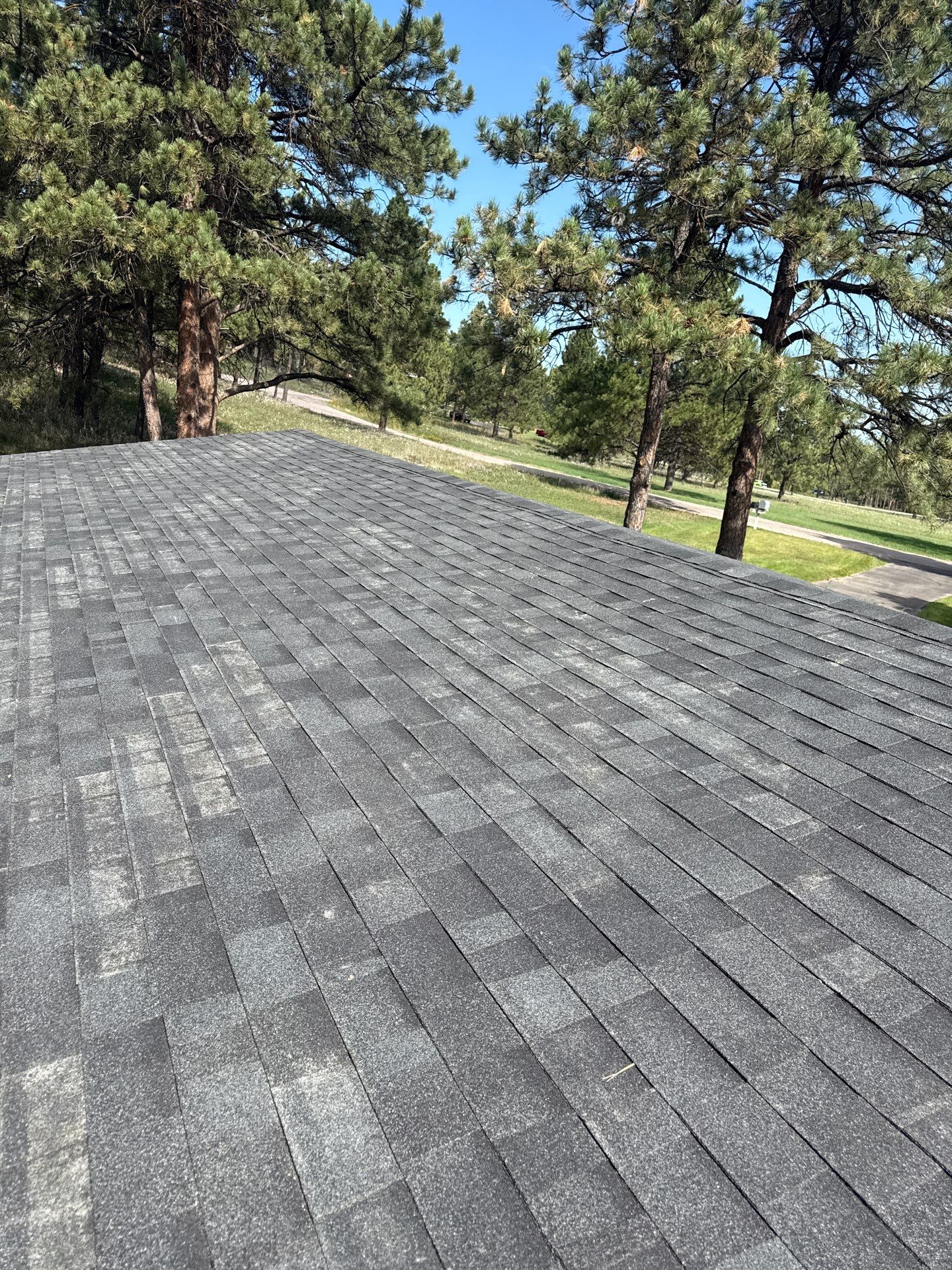 Full Architectural Shingle Installation for Contemporary Rapid City Residence by Weather-Tite Exteriors LLC