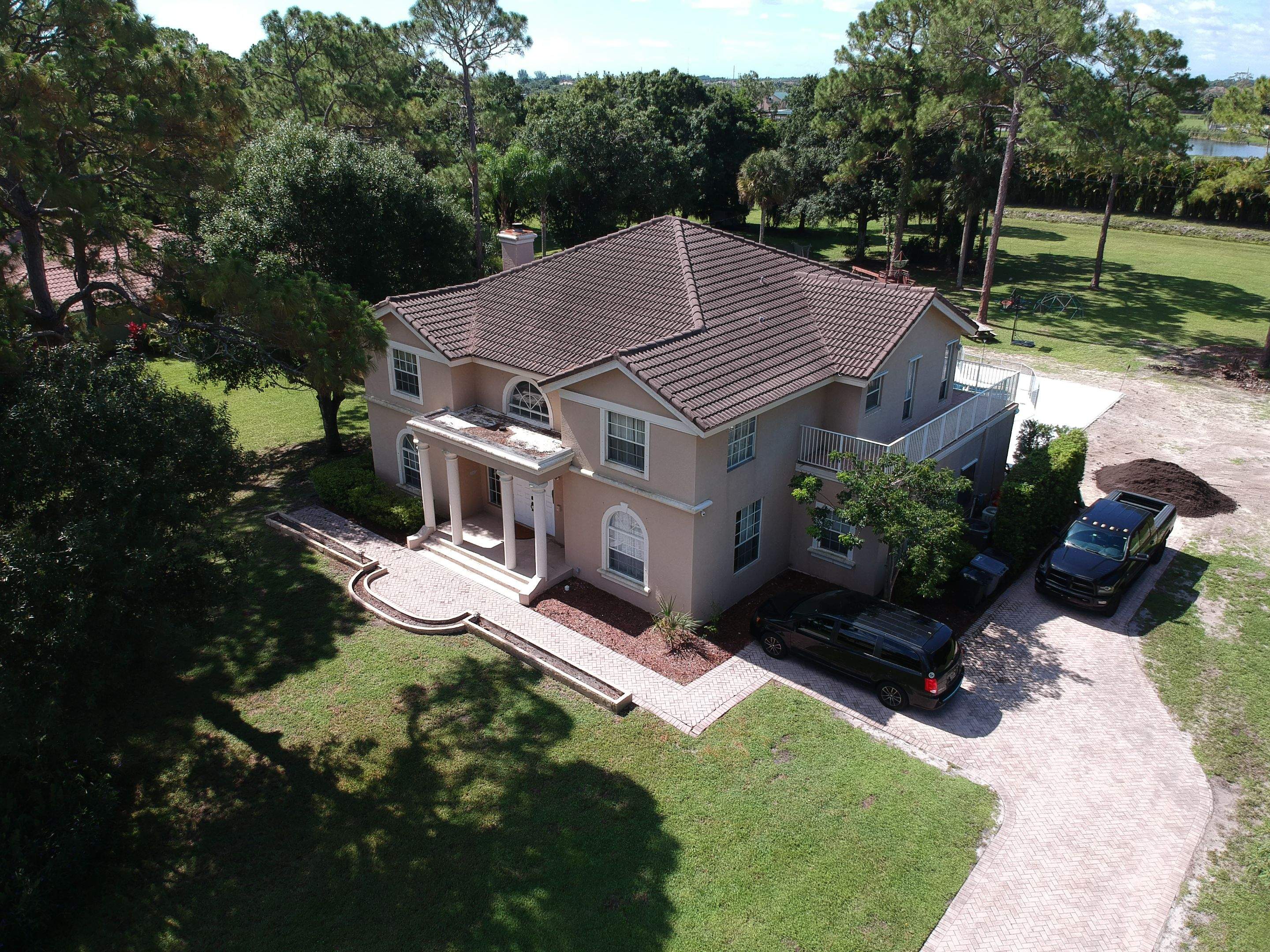 Residential Roofing Installation using 1" Nail strip metal roof by BLUES BROTHERS CONSTRUCTION CORP