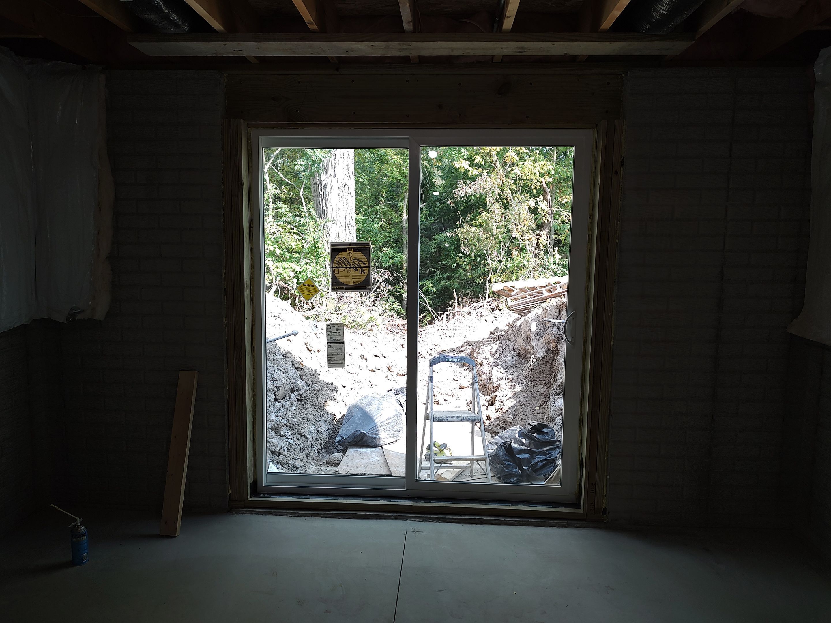 Egress Door Install using Egress Sliding Walk-Out Basement Door by Toledo Basement Repair