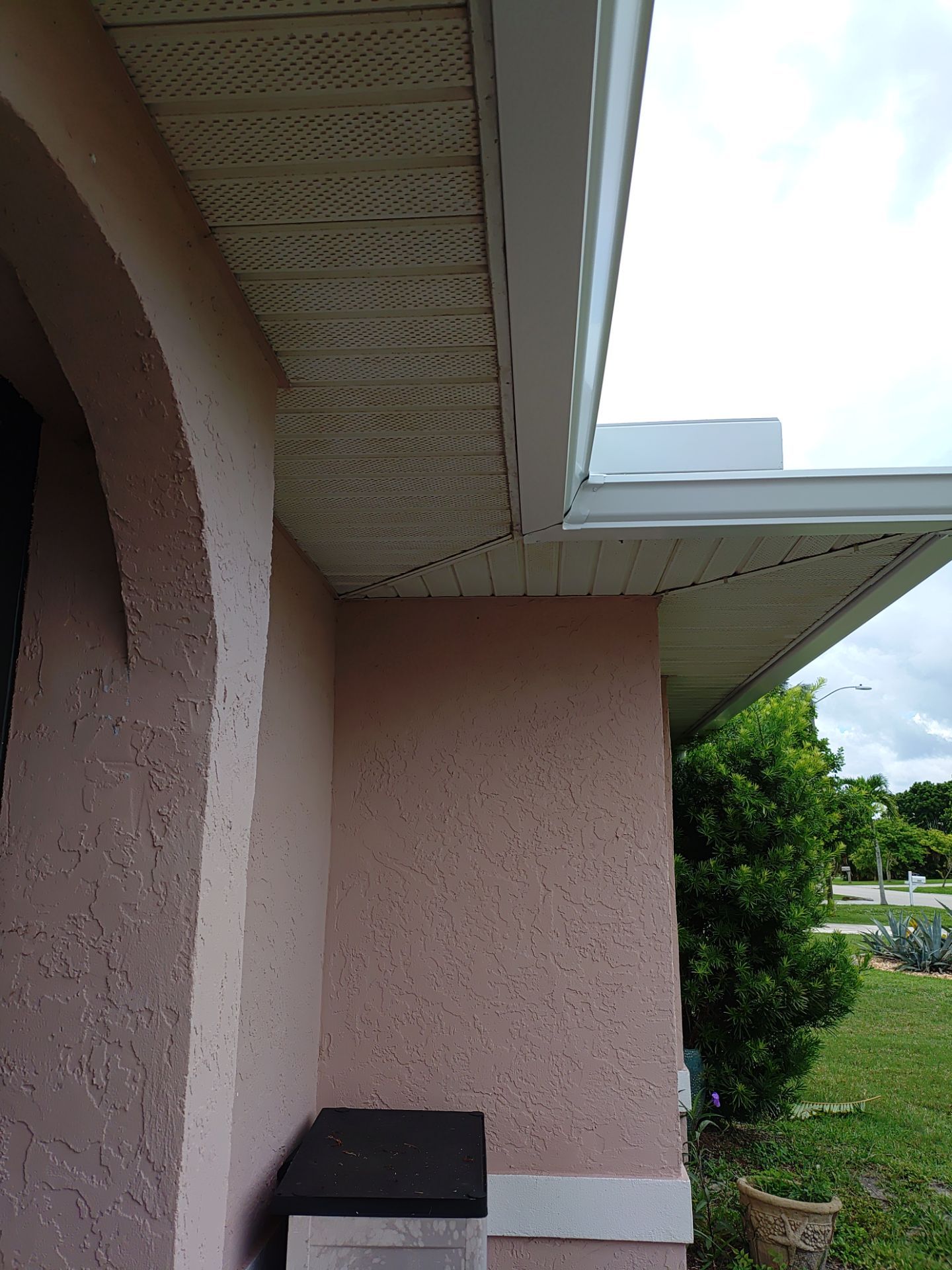 Replace gutter using White Down Spouts in Cape Coral FL by Gutter Professors