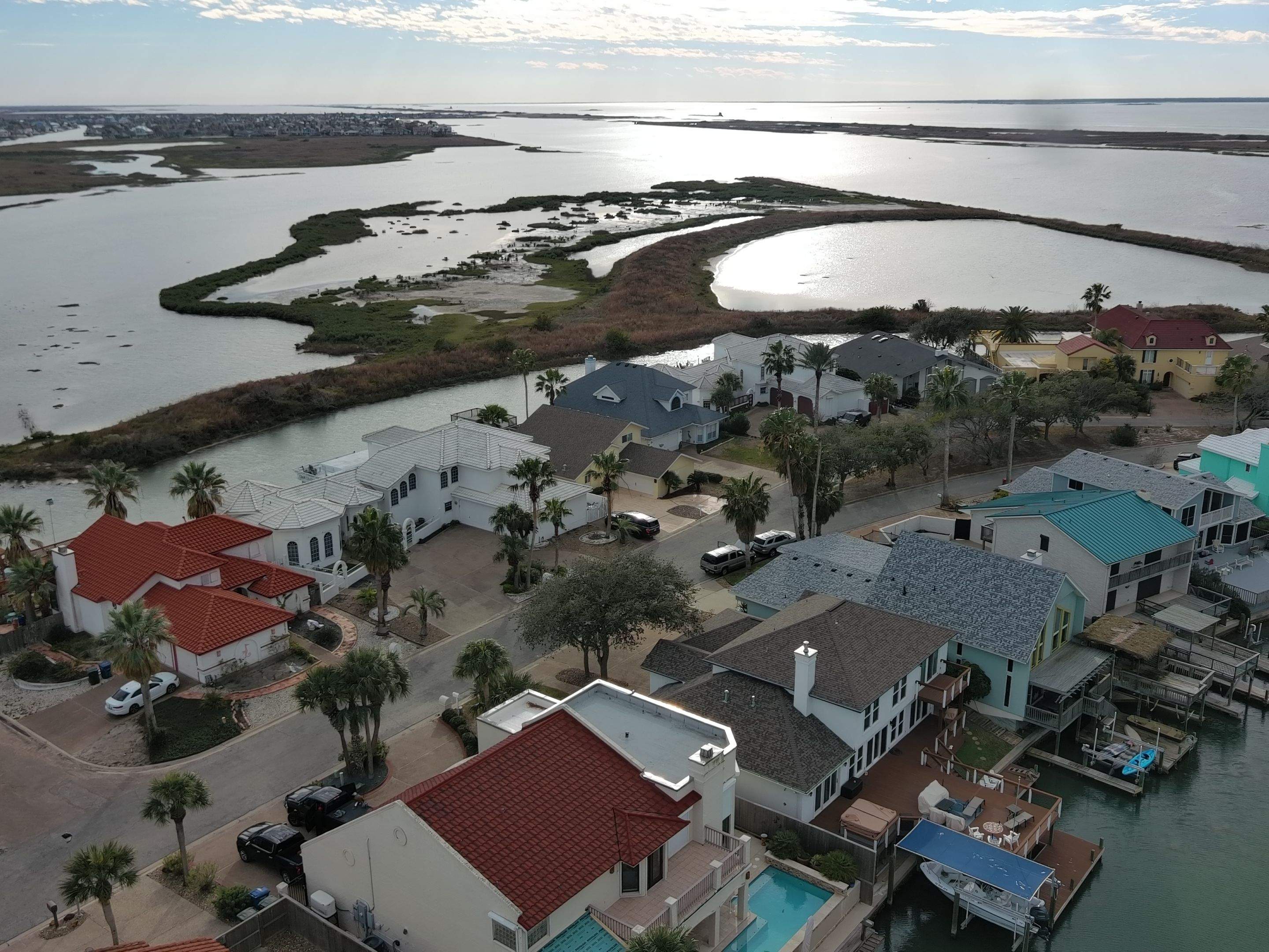 Off with the Tile and on with the TILCOR stone coated metal.  by Bayfront Roofing and Construction