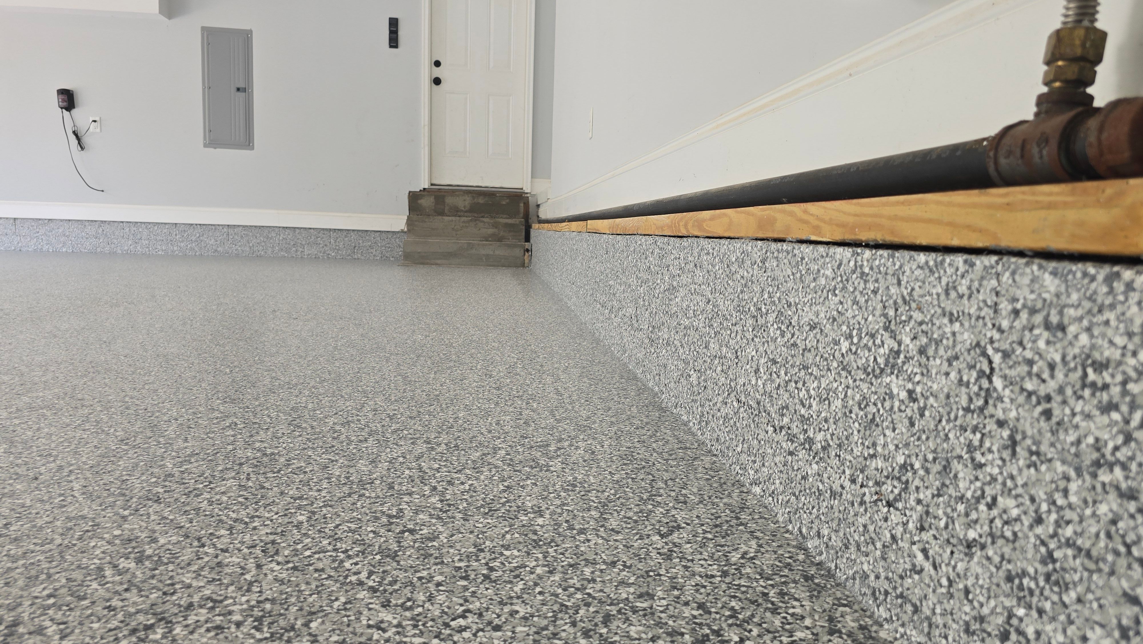 Garage using Gravel by Elite Floor Solutions