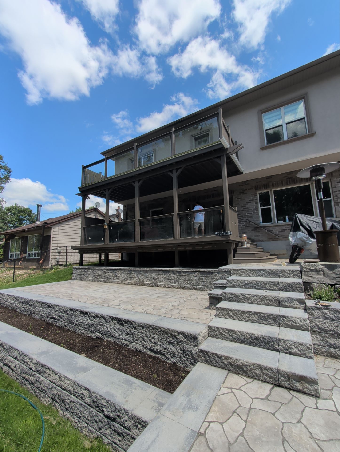 Multi-Level Deck Restoration and Glass Railing Installation in King by GTA HOME PAINTING