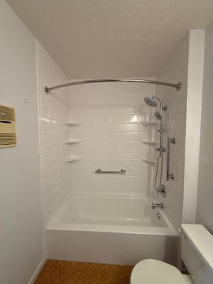 White Subway Tile Bath Remodel With Accessibility Upgrades In Traverse City