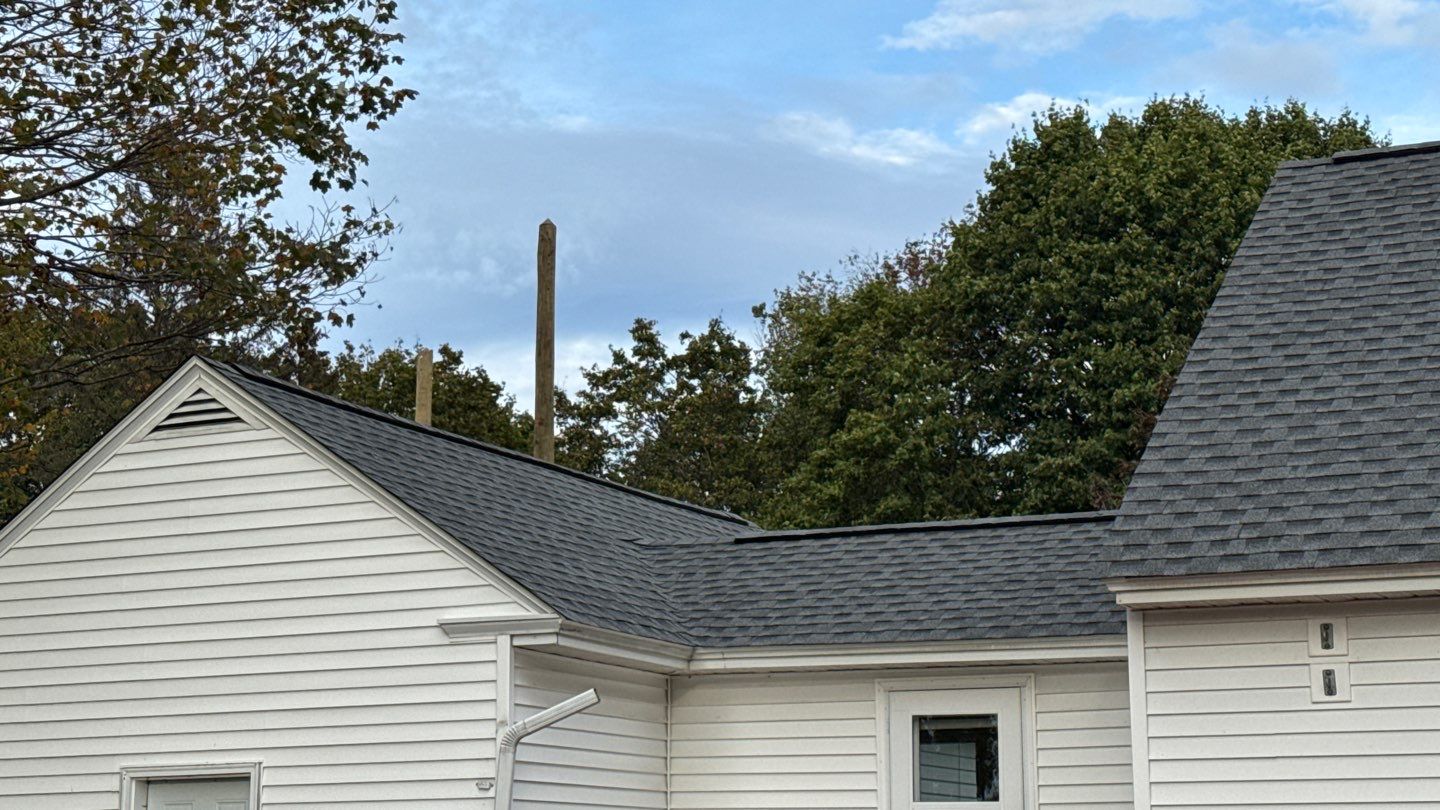 Complete Roof Replacement with GAF Pewter Gray HDZ™ Shingles, VELUX Skylights & New Gutters by Sensible Home Solutions