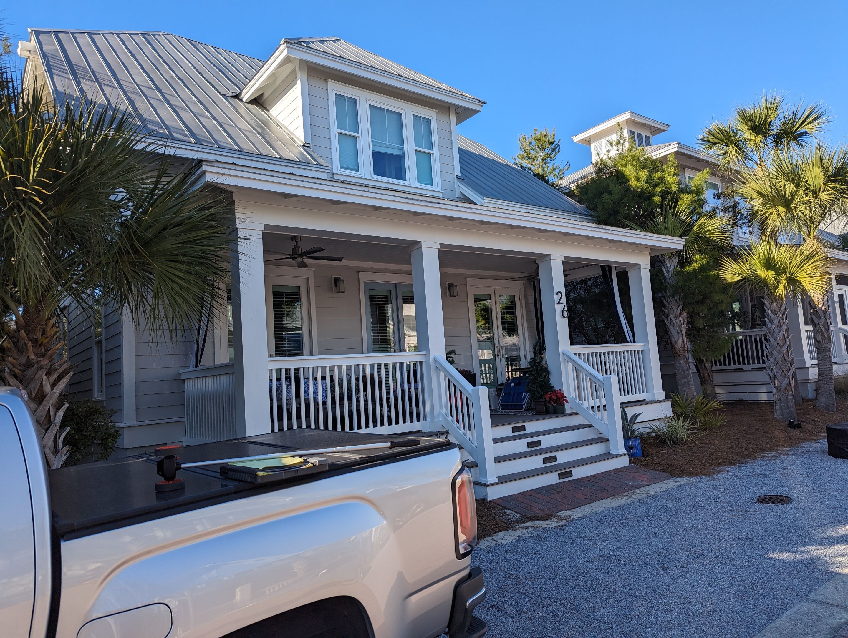 White Half-Round Gutters Installation in Rosemary Beach, FL by Gutter Professors
