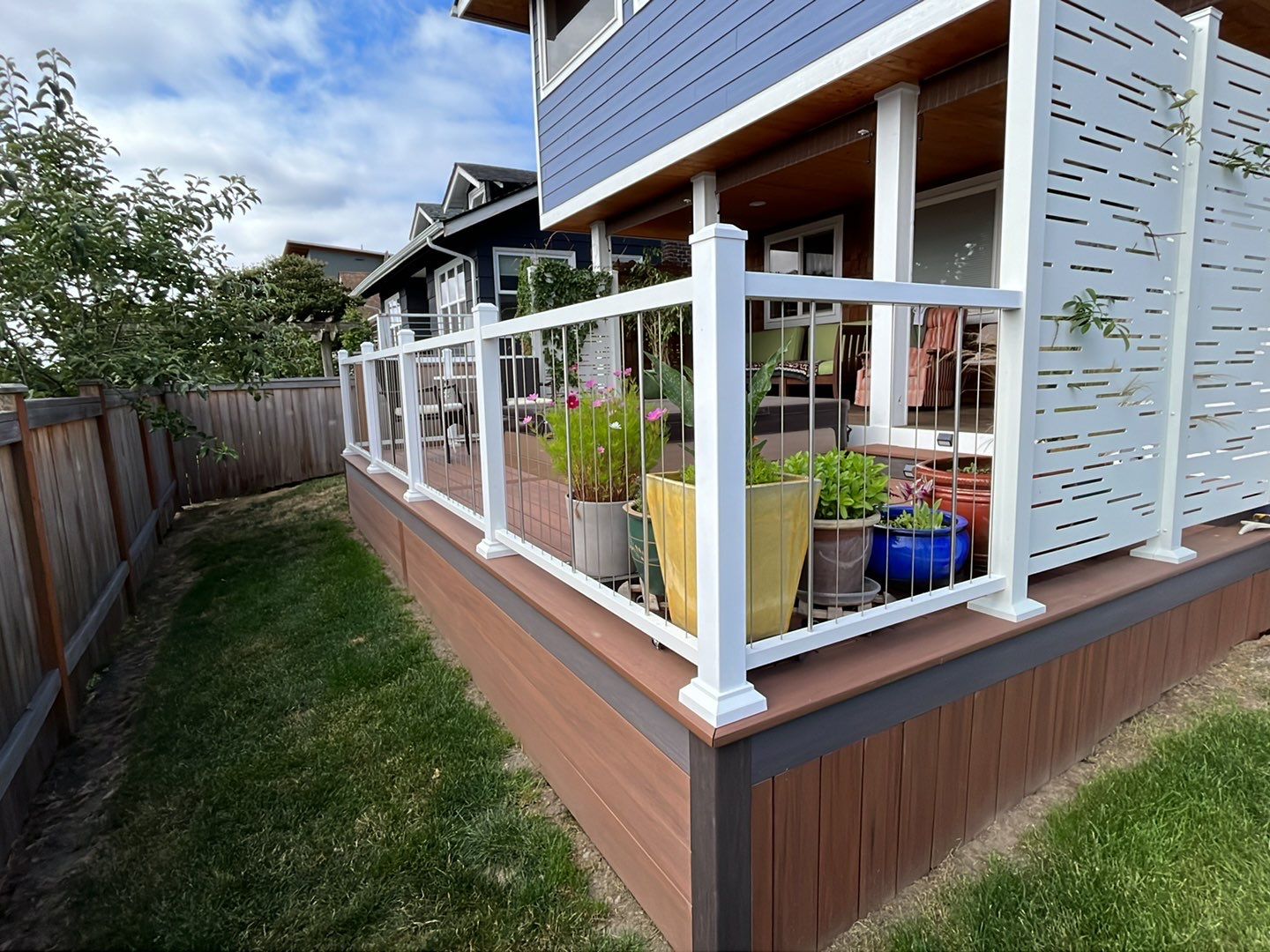 Deck Extension with Hideaway Screen by Alki deck builders 