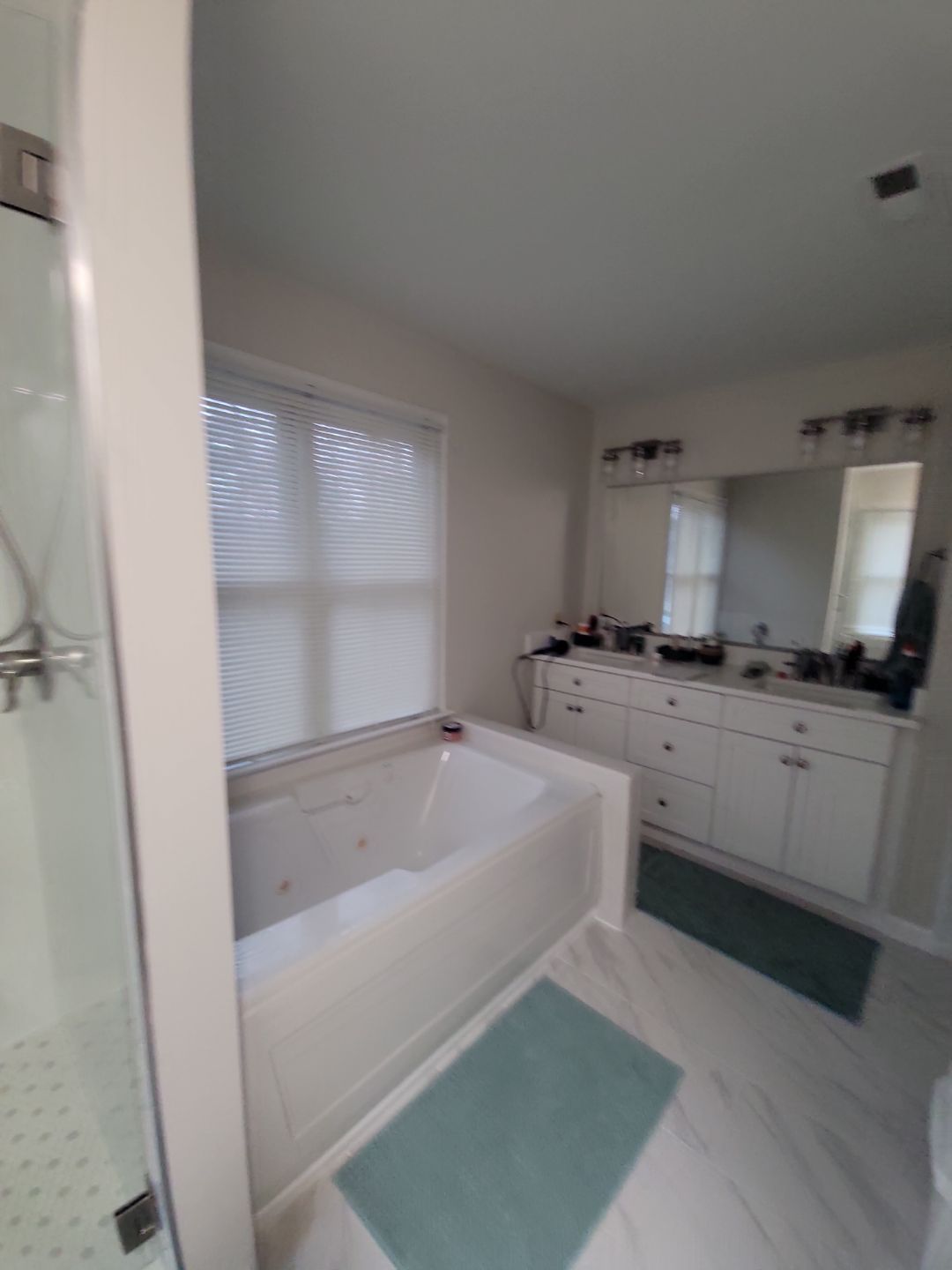 From Cramped & Carpeted to Bright & Modern: A Cary Bathroom Transformation by Elite Remodeling and Design LLC
